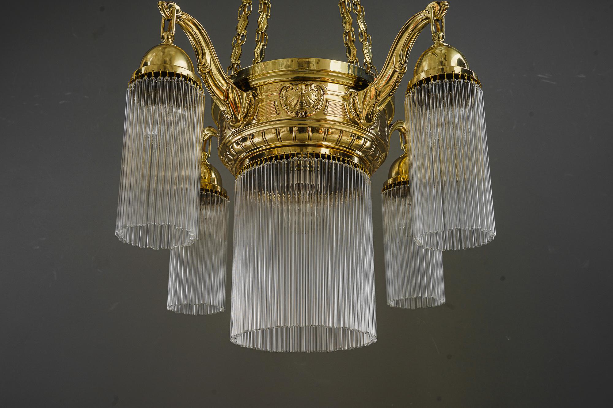 Polished Art Deco chandelier with glass sticks vienna around 1920s  For Sale