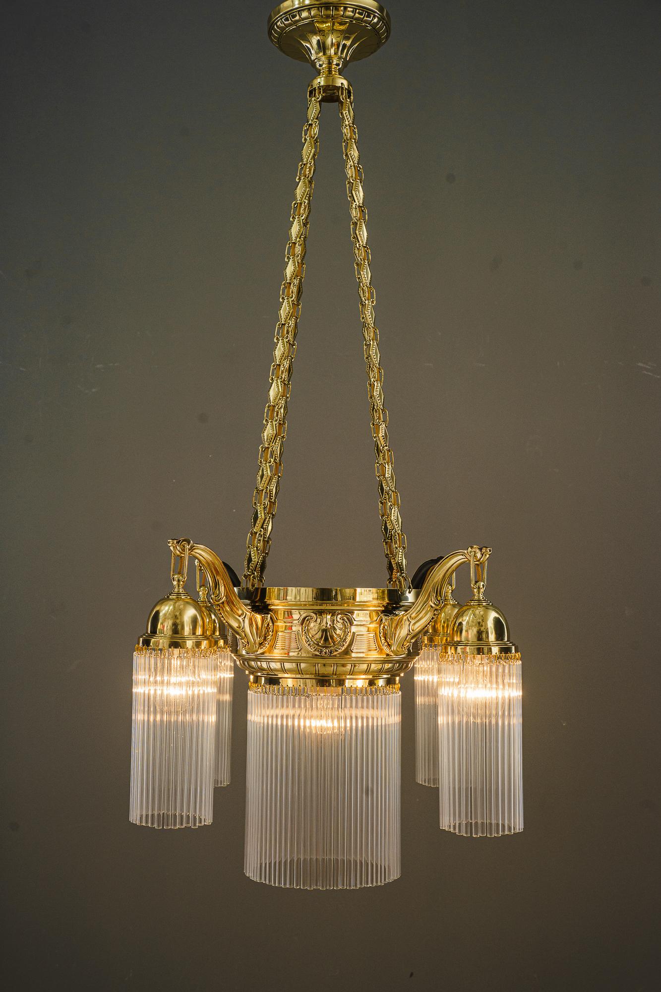 Brass Art Deco chandelier with glass sticks vienna around 1920s  For Sale
