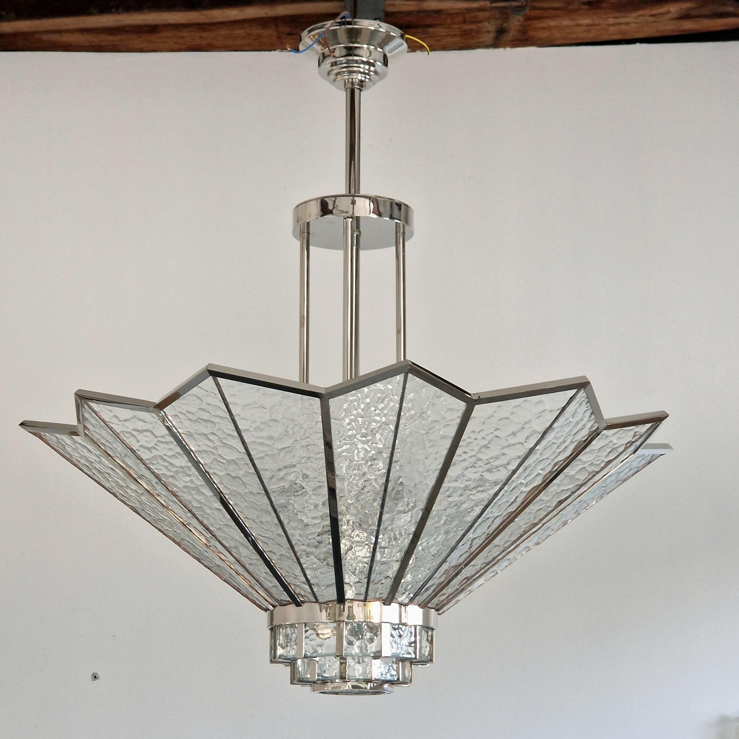 Luminous Art Deco Chandelier with nickel finish and Monumental Tiffany Glasses.
