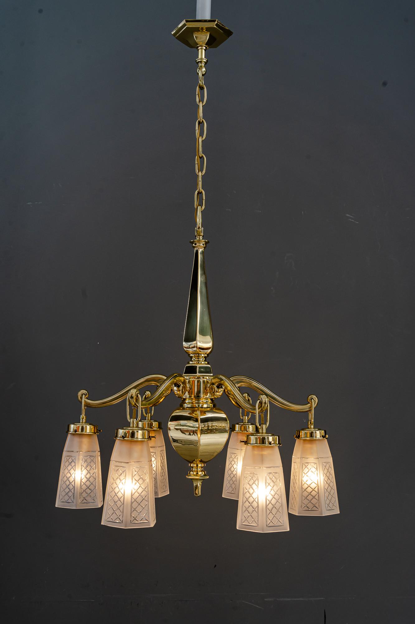 Art Deco chandelier with original glass shades Vienna around 1920s 
Polished and stove enamelled
Original glass shades
new wired.