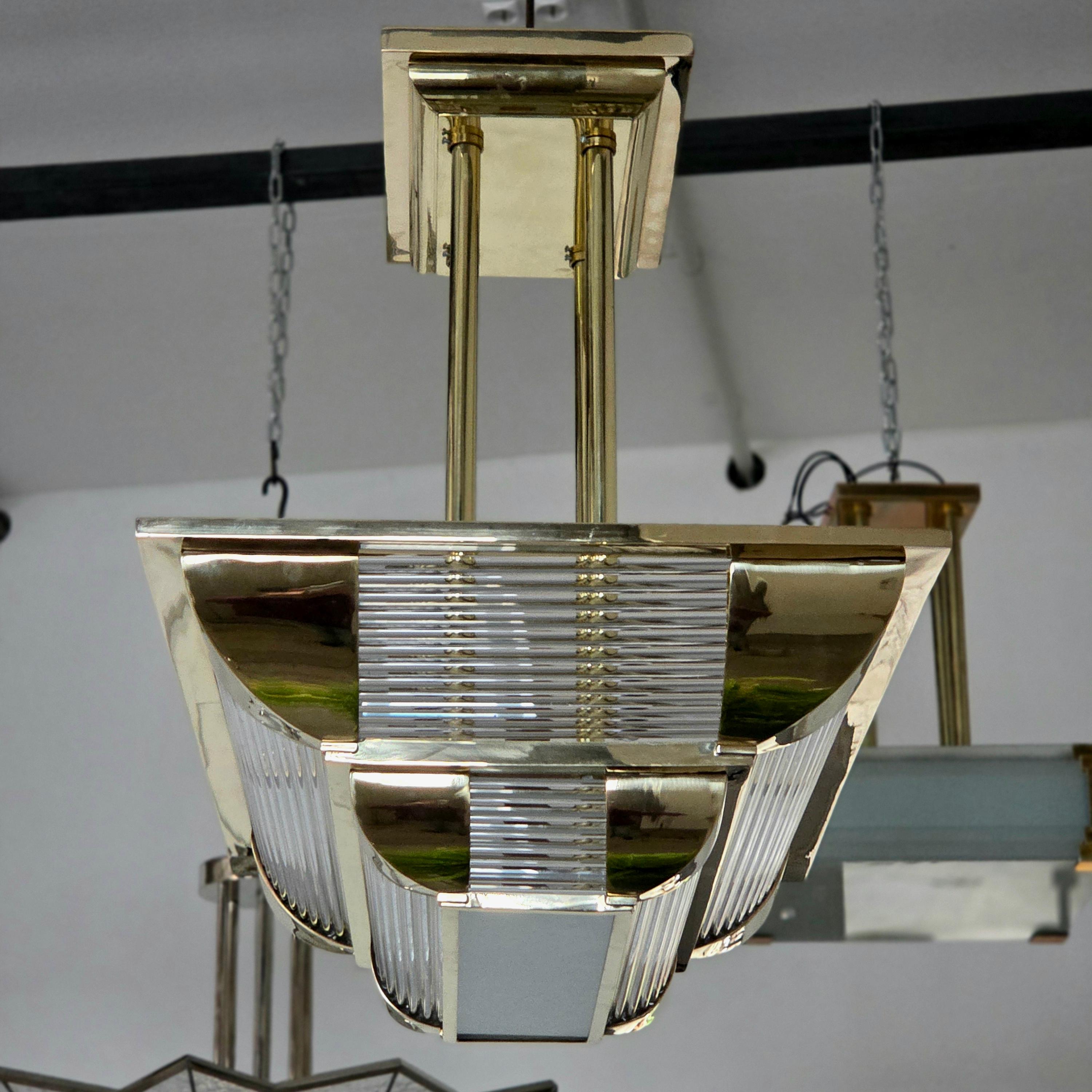 Hand-Crafted Art Deco Chandelier with polished bronze finish For Sale