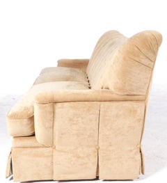 Tall Channel Back and Skirted Art Deco Sofa In Camel Velvet.