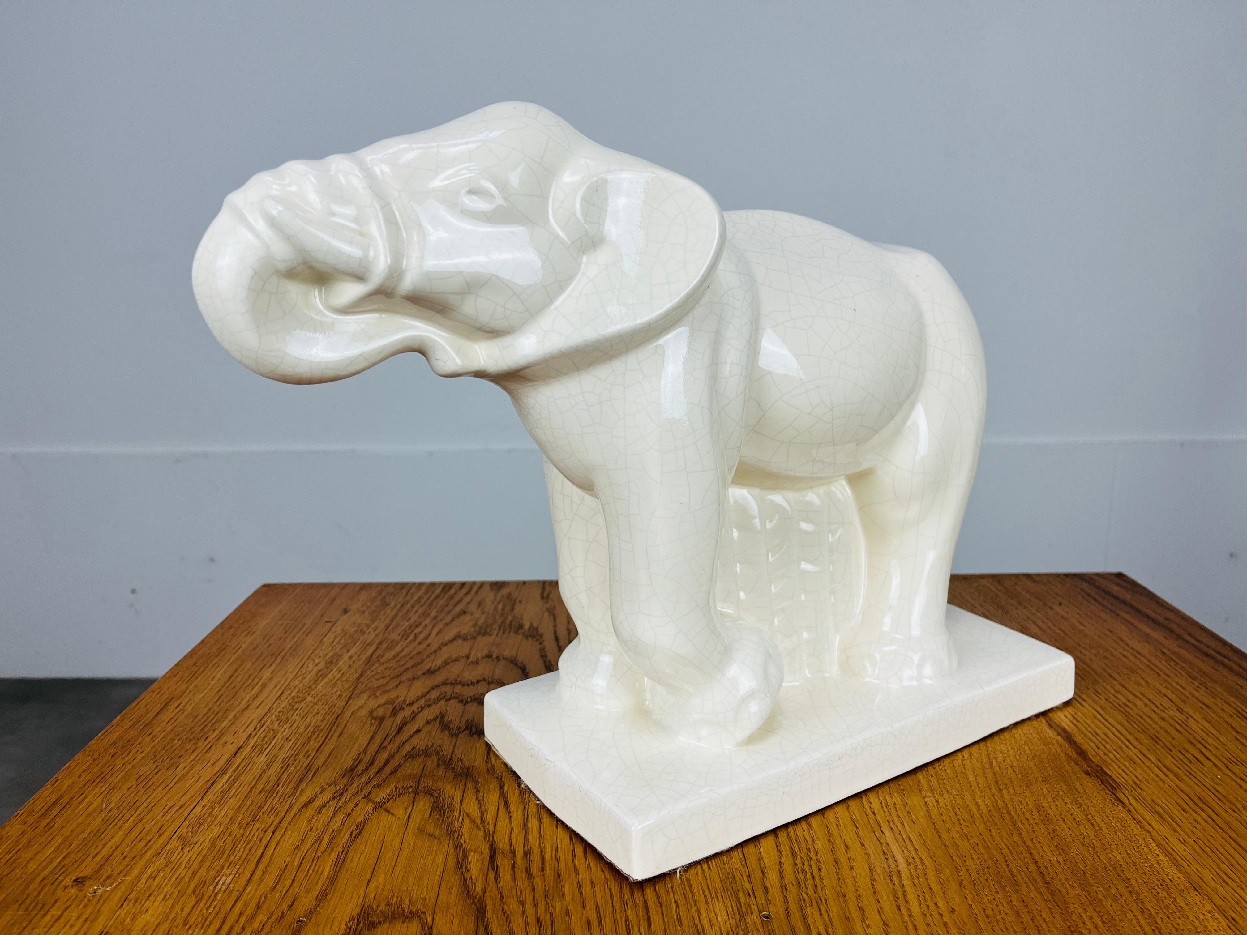 French Art Deco crackle ceramic elephant sculpture, designed by Charles Lemanceau for the ceramic manufacture Saint-Clément in the 1930's. Perfect condition. 