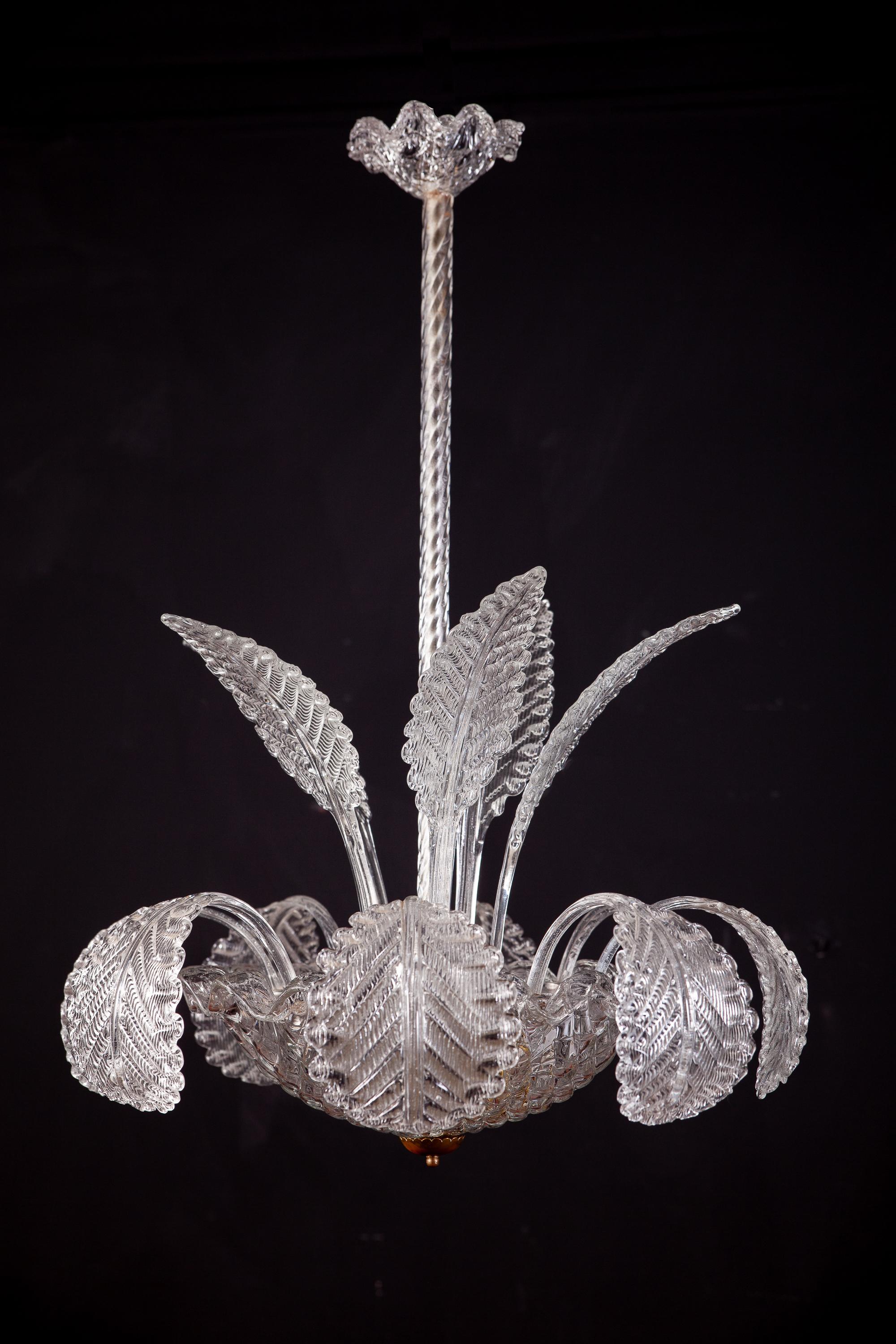 Elegant hand blown Murano glass chandelier By Ercole Barovier.
Excellent vintage condition.
Three E 27 light bulbs.