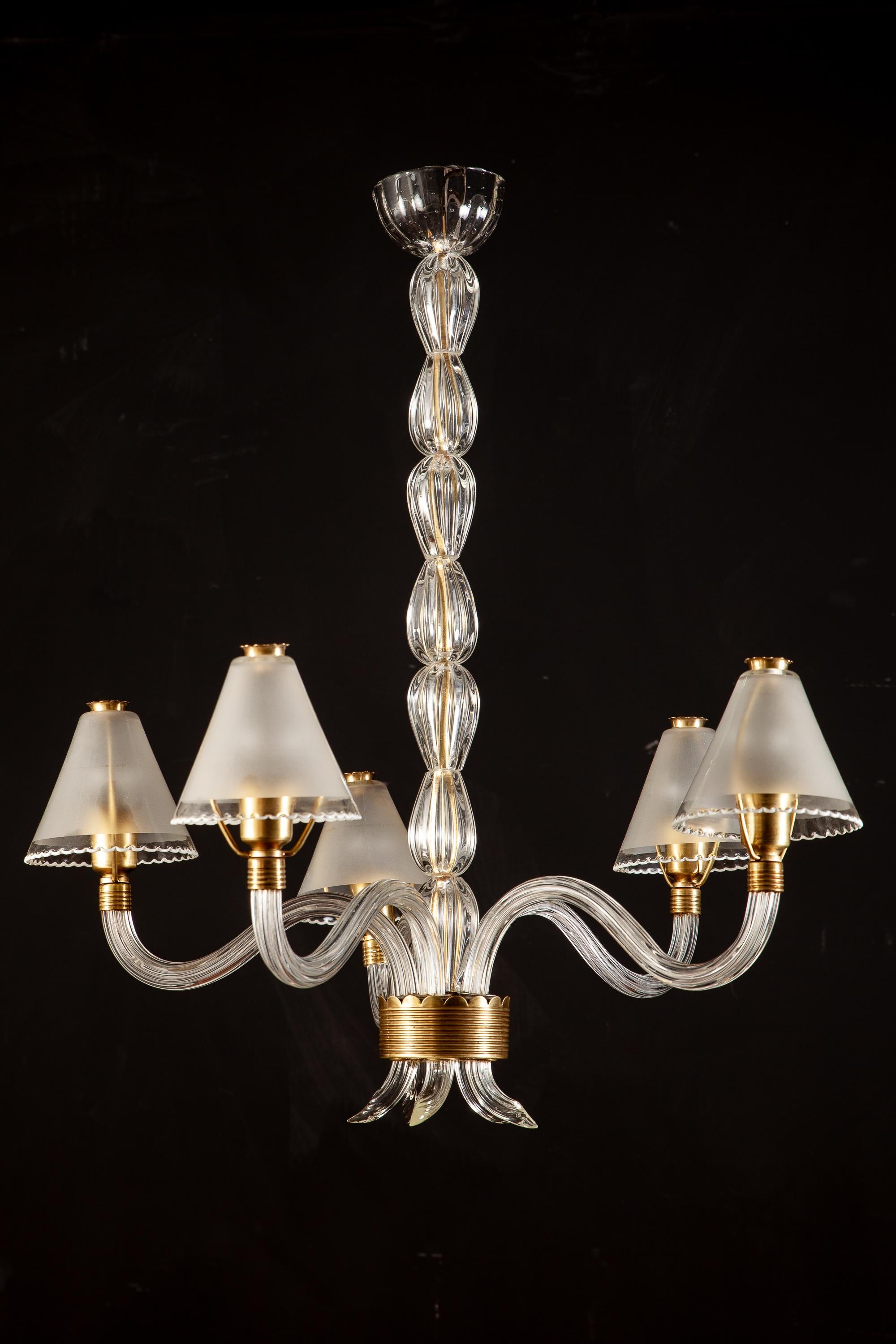 Five arms Murano glass chandelier with original delicious opaline glass shadows supported by a brass frame.
Elegant Design by Ercole Barovier.
Excellent vintage condition.
Five E 14 light bulbs.