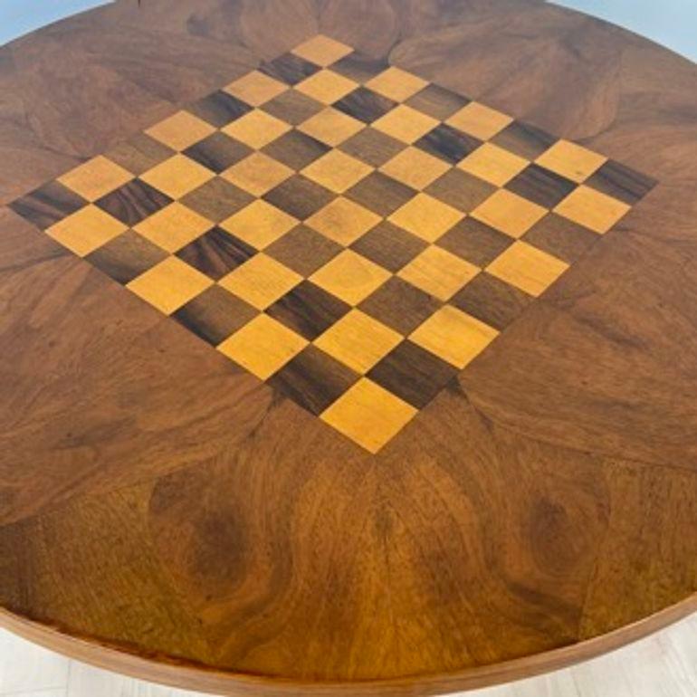 Beautiful Art Deco Chess Table from Austria, Vienna around 1930.
Walnut veneer on the top with walnut and maple checkerboard. Solid beech feet with shelf in between. Restored and hand polished with shellac.
Dimensions:
* Metric: H 63 cm x Ø 69 cm
*