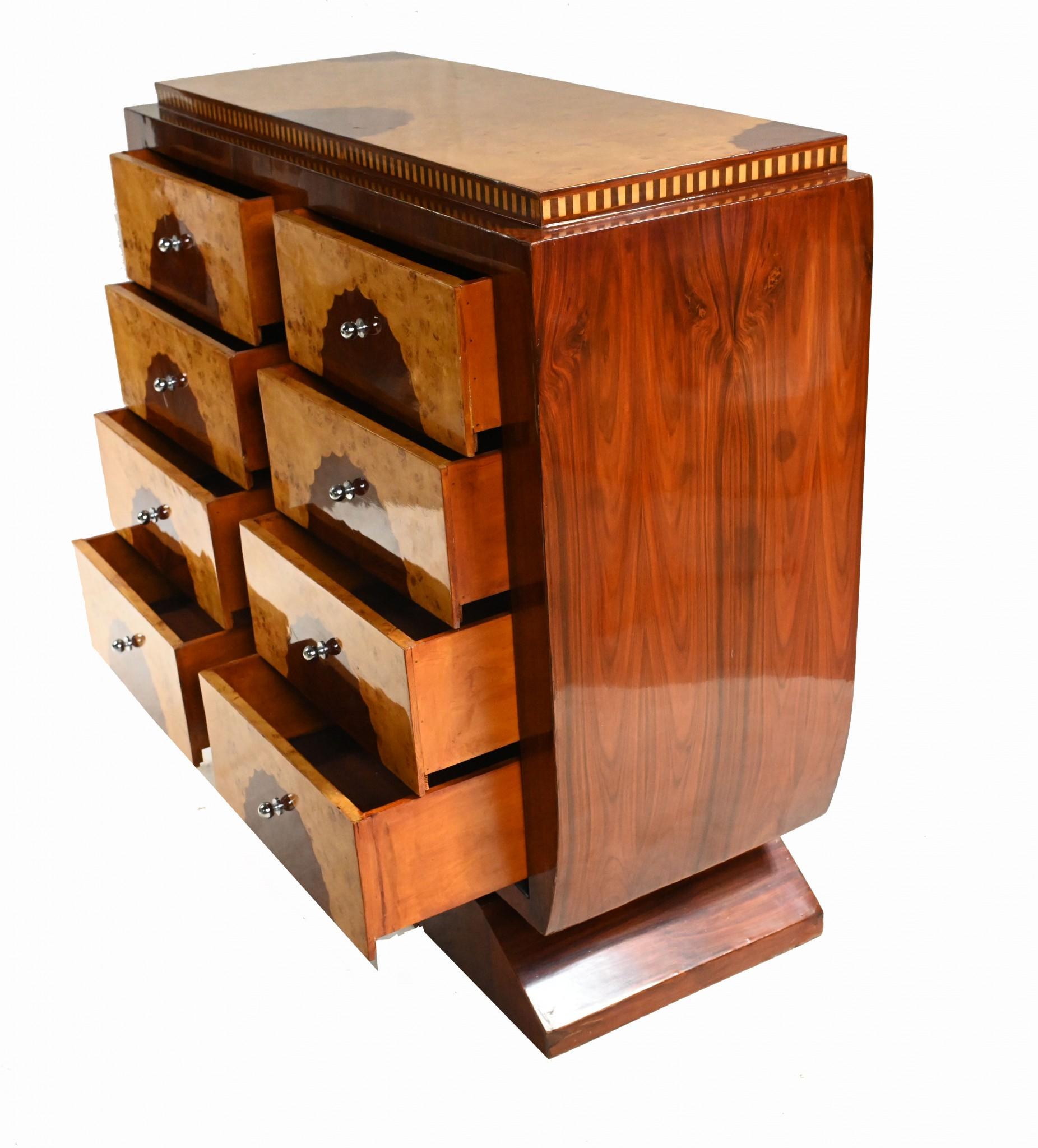 Amazing art deco style chest of drawers or commode
Very eye catching piece, particularly with interplay between different coloured woods
Features eight drawers, four on eithe side
Clean and minimal design perfect for modern interiors
Offered in