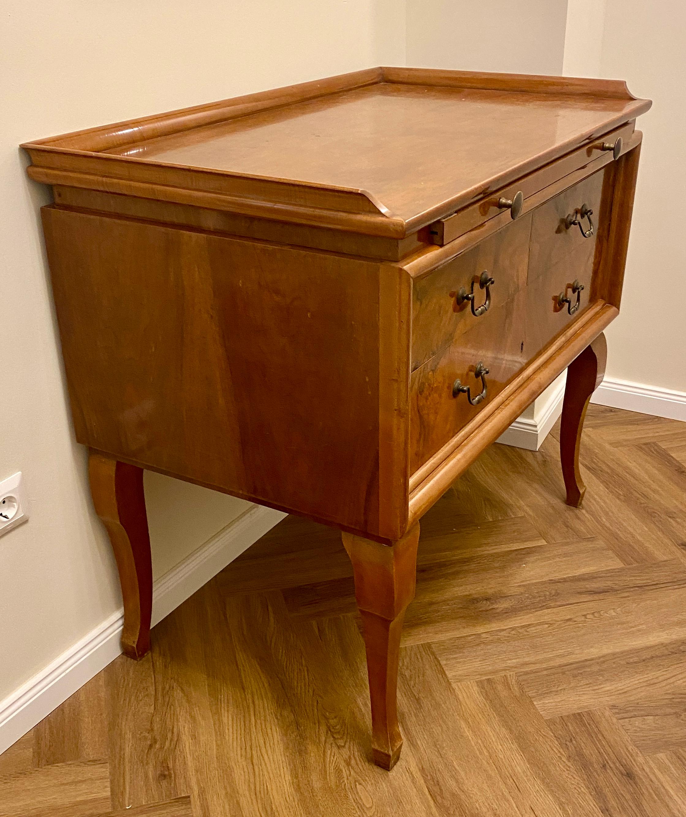 Rare Art Deco Chest of Drawer combined  with extractable desk with six drawers and brass hardware. Signed Lingel  the Famous Hungarian Furniture Factory.
This commode an elegant look offer ample storage space, is in perfect vintage condition.

The