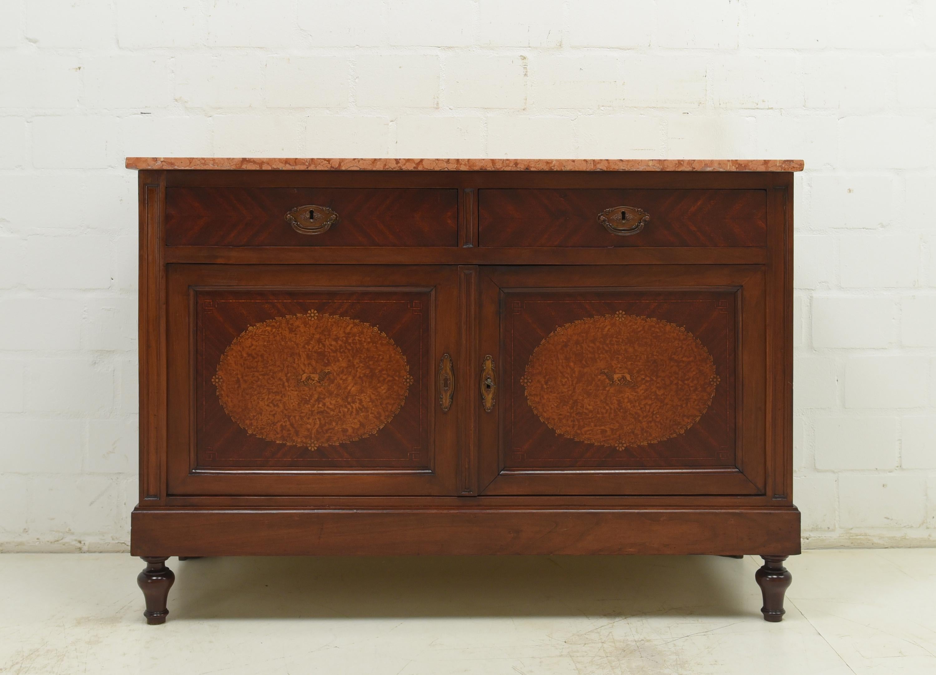 Chest of drawers restored Art Deco circa 1925 mahogany marble cabinet

Features:
High-quality veneer with root wood
Original fittings
Rose marble top with slight damage
Attractive model

Additional information:
Material: Mahogany, part