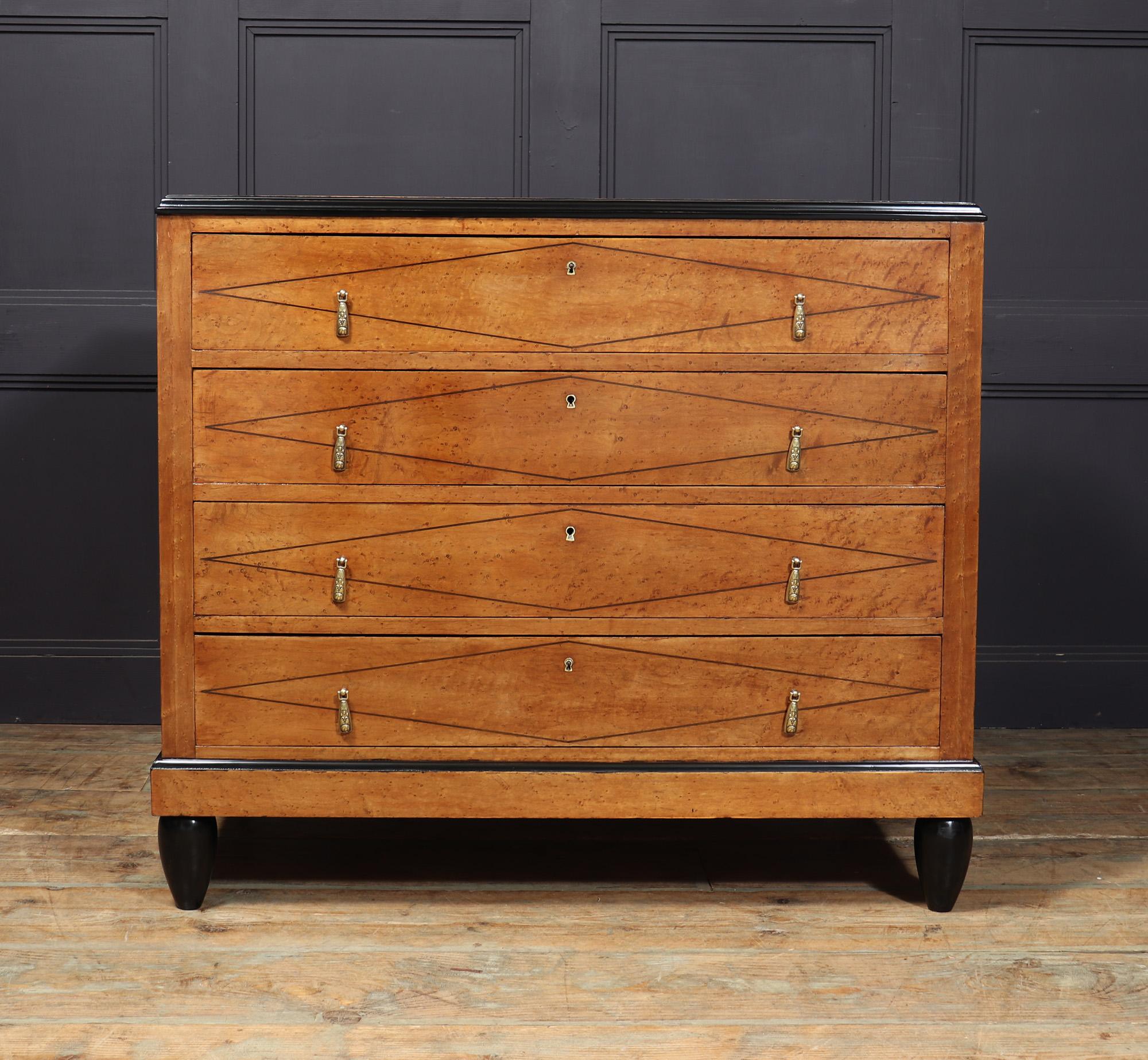 ART DECO CHEST OF DRAWERS 
A lovely little chest of drawers with four long drawers in Birdseye maple with string line inlay, brass drop handles standing on turned feet and ebonies detail, carefully restored and fully polished by hand and in great