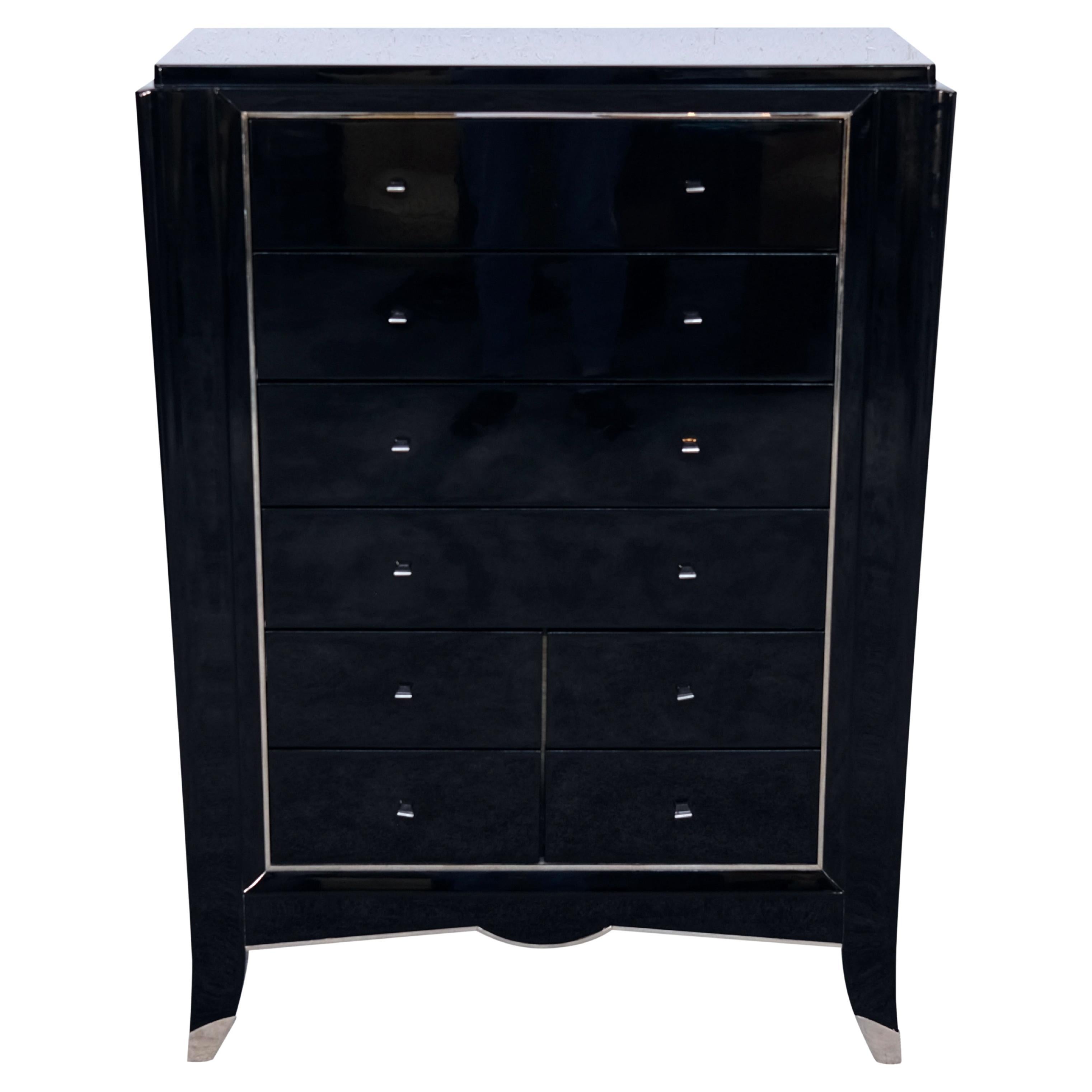 Art Deco Chest of Drawers in Black with Tapered Form and Metal Accents, 1930s