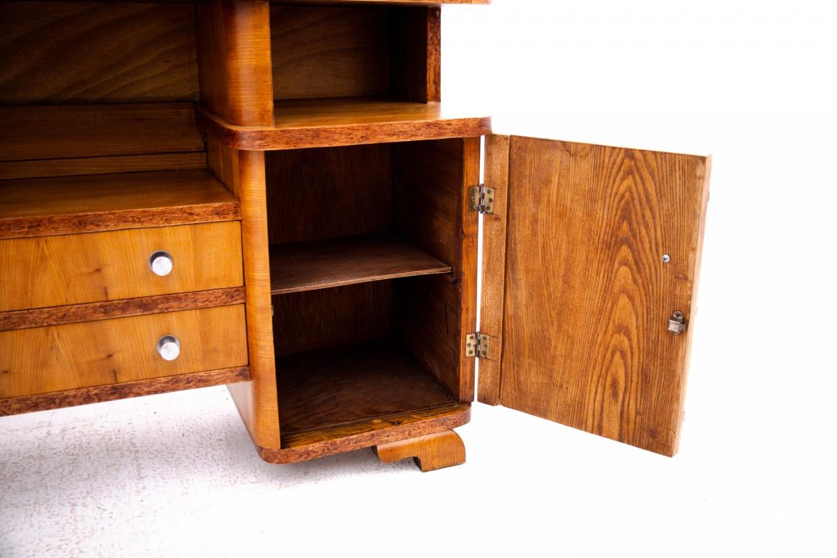Walnut Art Deco chest of drawers, Poland, mid-20th century. For Sale