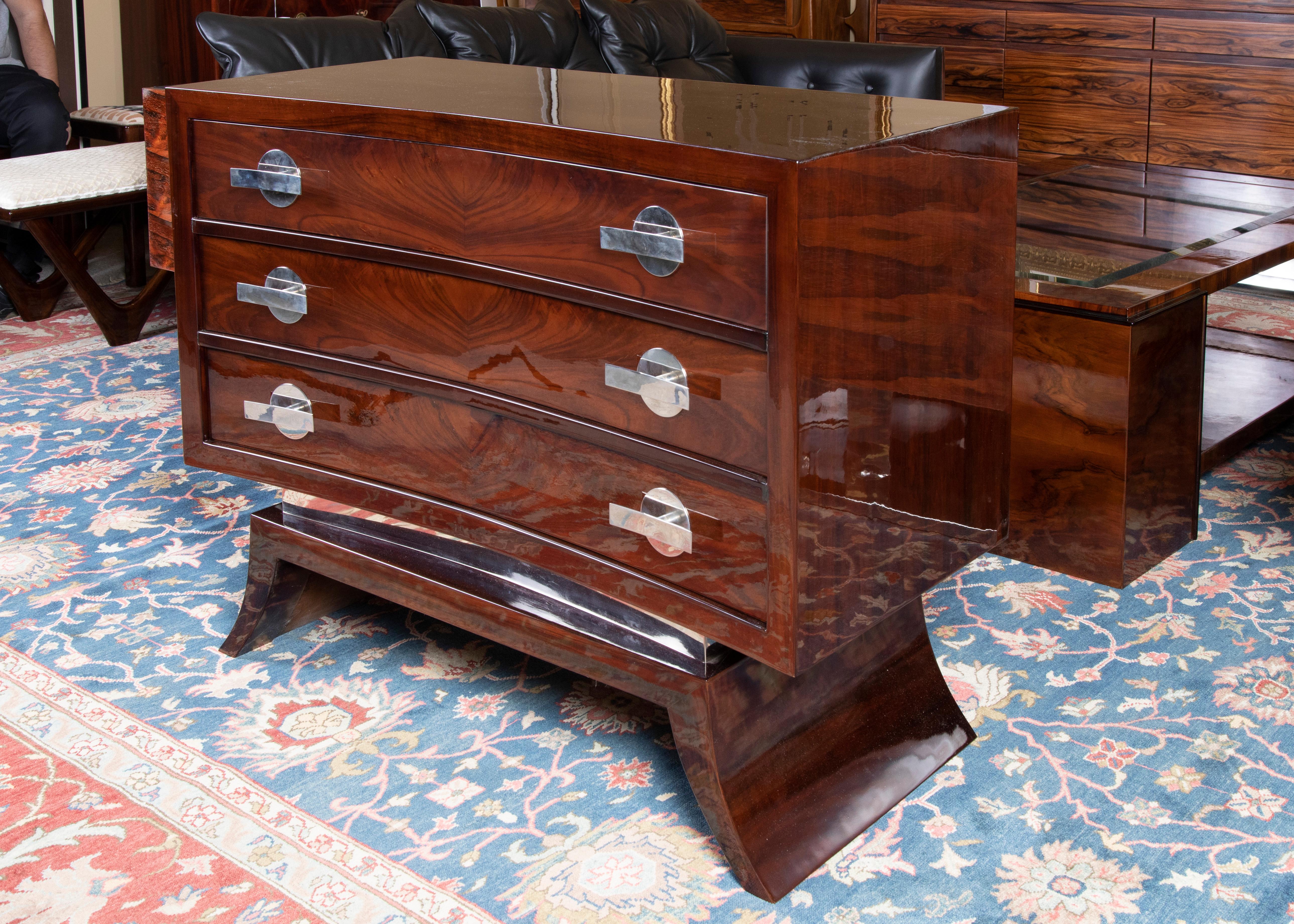 Pair of Art Deco chests of drawers from France
Chest of drawers is made out of walnut wood, has 3 spacious drawers with 2 handles each. Resting on trapezoid base. Front of the chest of drawers was curved. 

Condition is perfect.