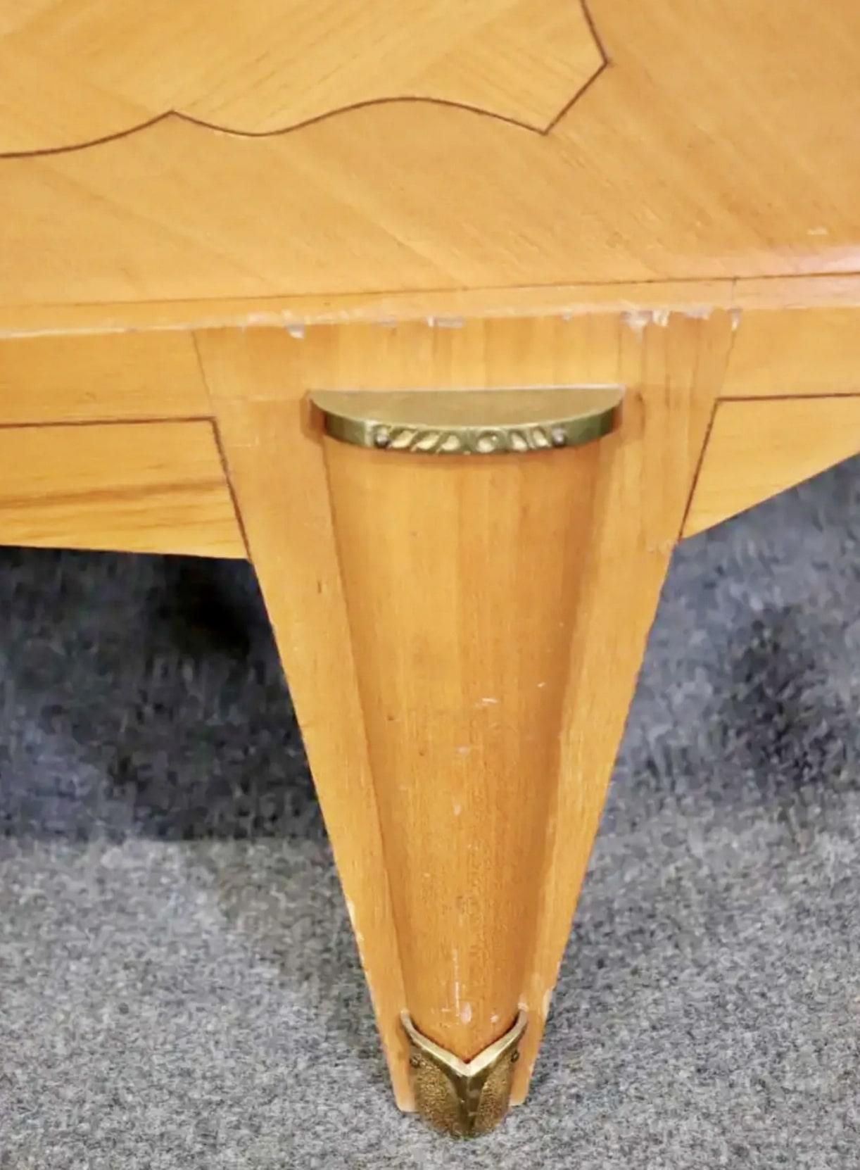 Glass front display cabinet from France with brass hardware and trimming. Diamond shape marquetry designed cabinet doors.
Please confirm location NY or NJ