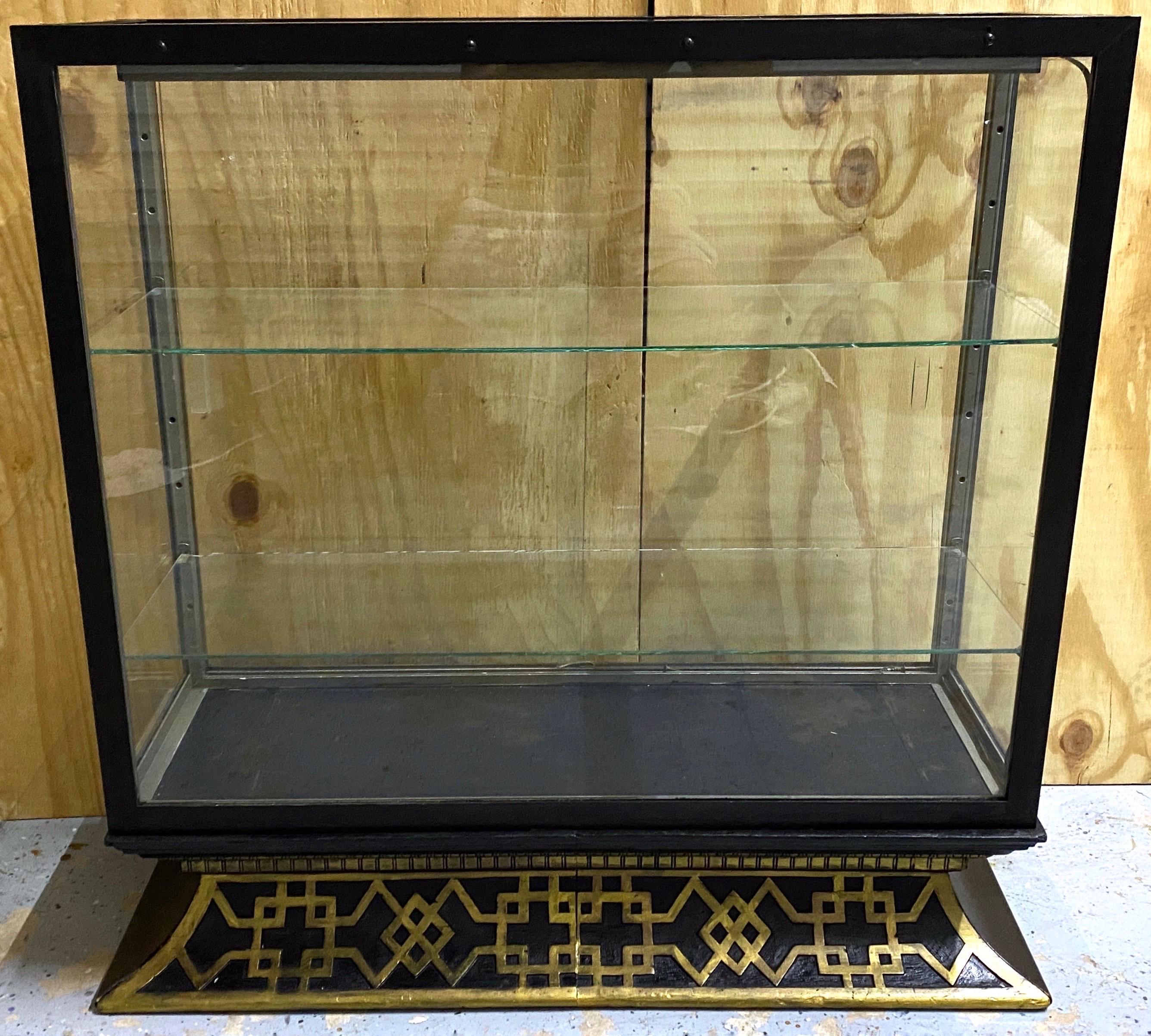 Art Deco Chinese Motif Display Case, From Cartier NYC Showroom, Circa 1920s 

Cartier showroom store fixture, Provenance by Repute, 
Saved from the refuse pile of a 1960s renovation NYC Cartier retail showroom. 

This exquisite Art Deco Chinese