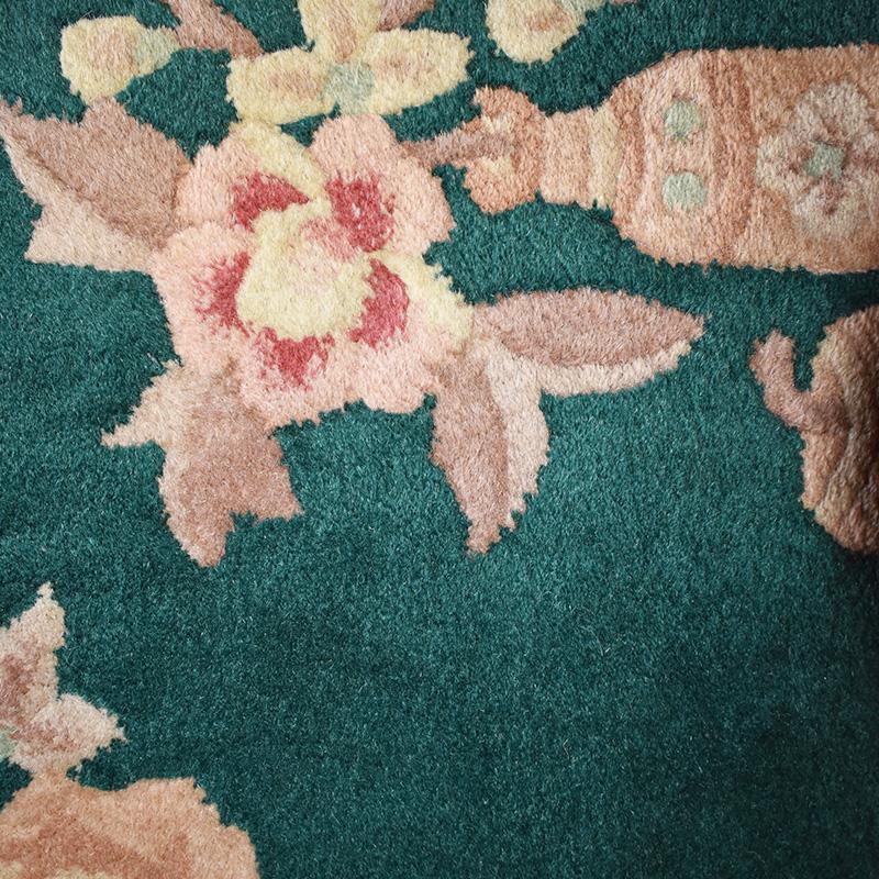 emerald green and pink rug