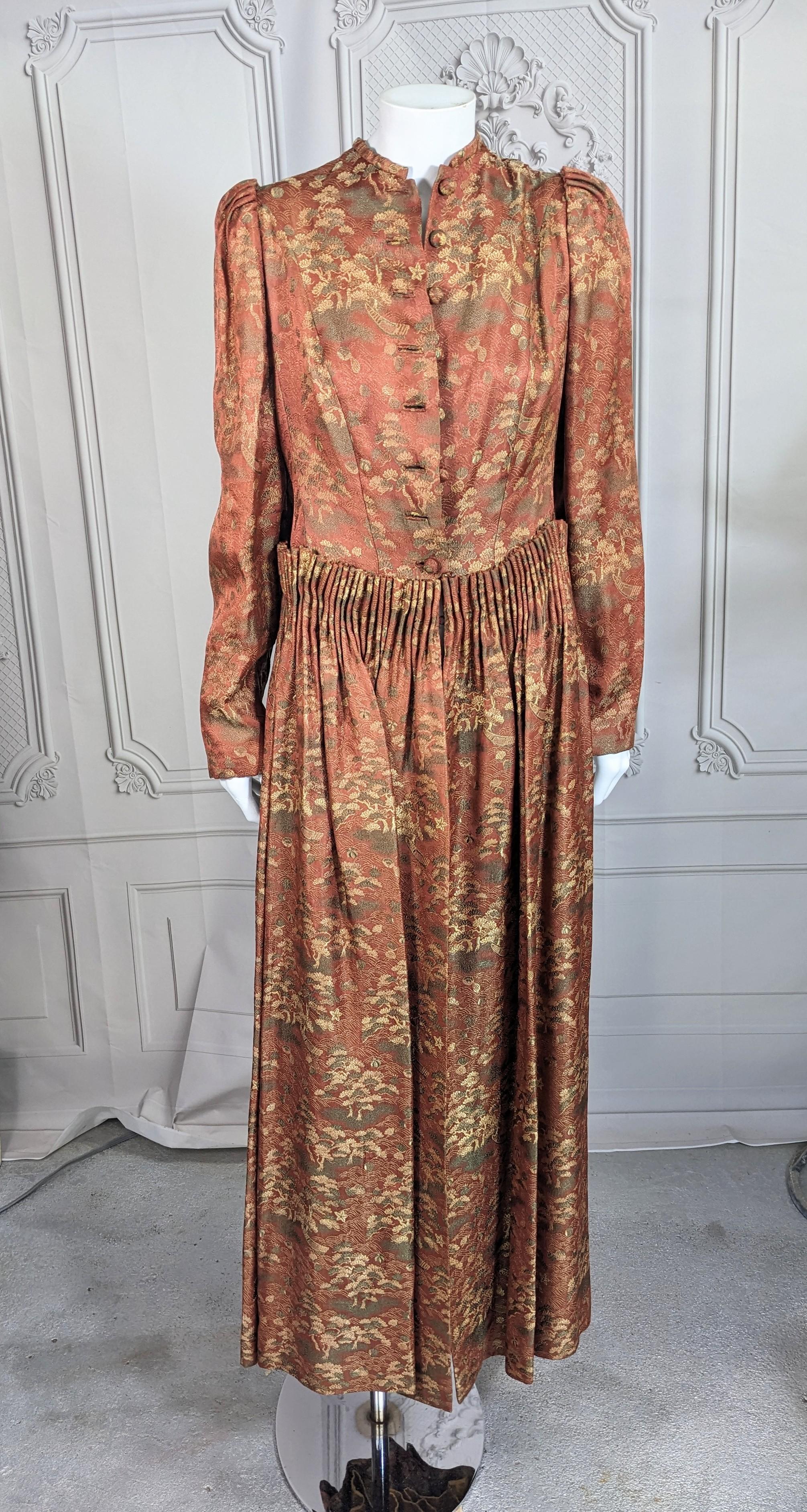 Art Deco Chinoiserie Evening Coat from the 1930's with cartridge pleating details at waist and shoulders. Designed as an indoor hostess coat for chilly weather, it can be easily worn for evenings out. Lined in yellow satin with light batting and