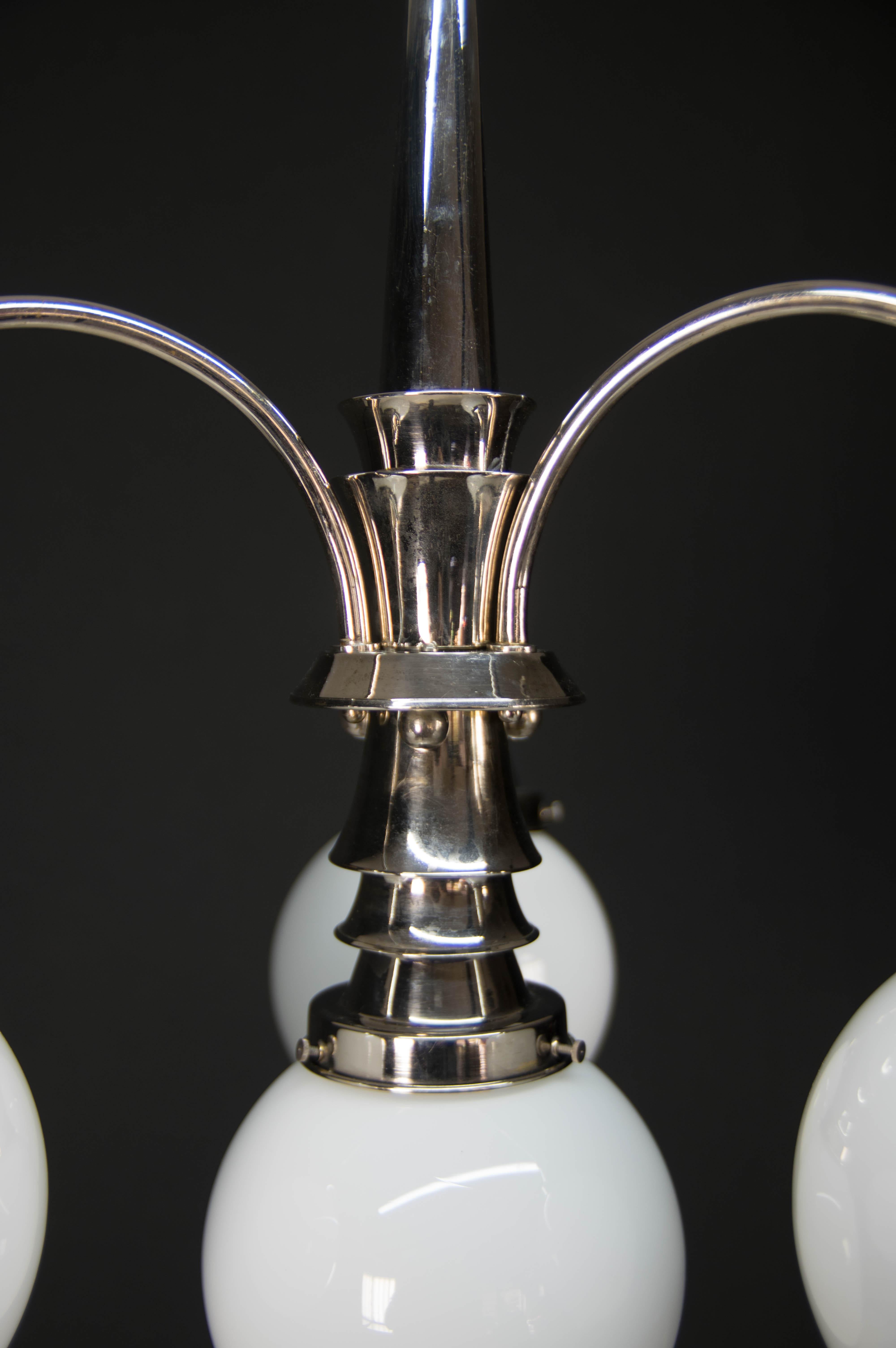 Completely restored, polished.
Diameter of the globe 16cm
4x40W, E25-E27 bulbs
US wiring compatible.