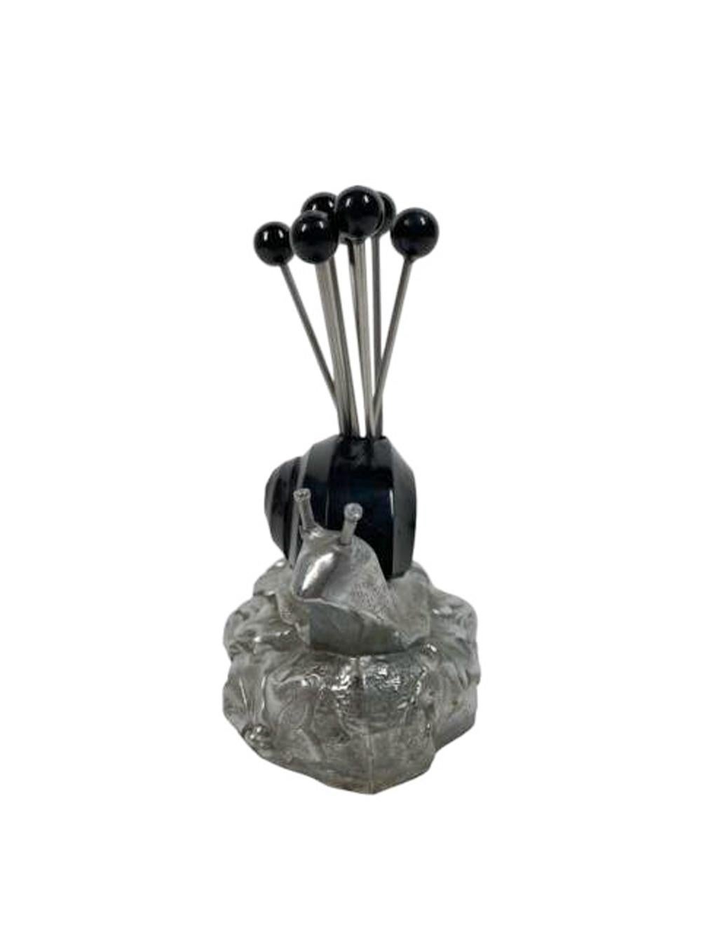 Art Deco cocktail picks with black Bakelite ball tops in a snail-form chrome stand with carved black Bakelite shell.