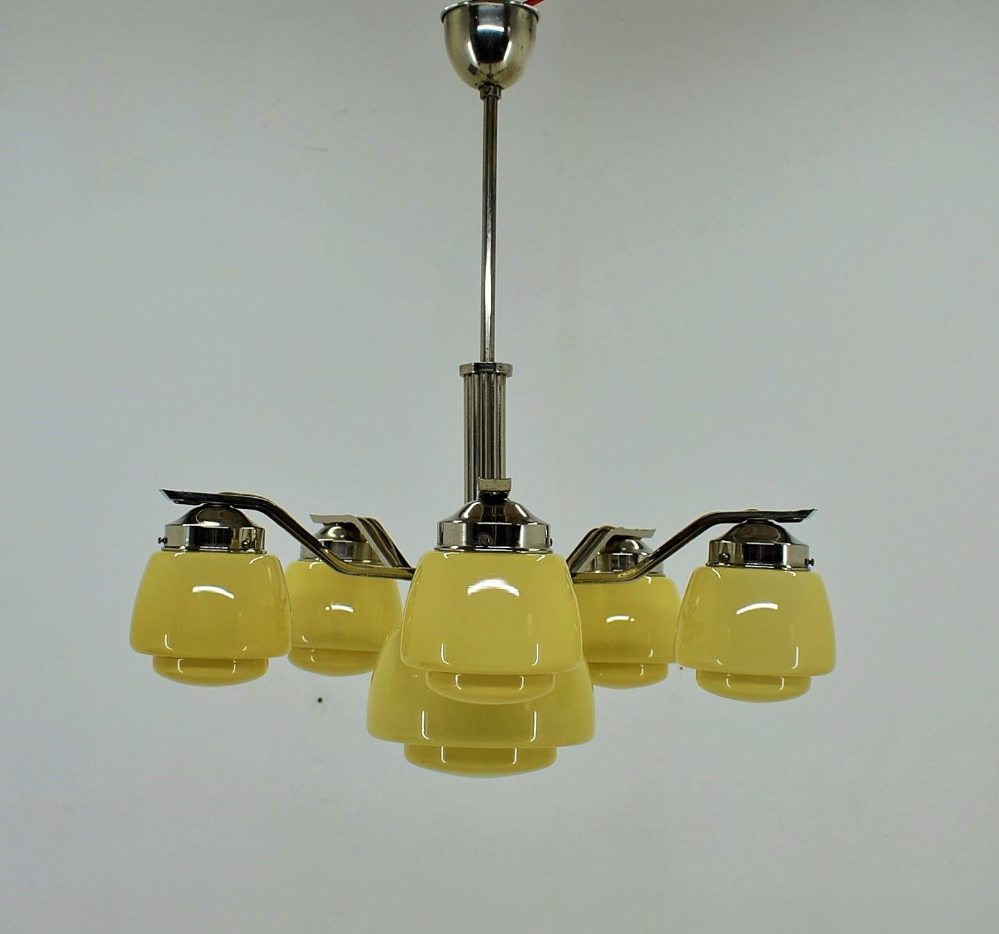 Beautiful Art Deco chandelier made of chrome and glass.
Good condition.