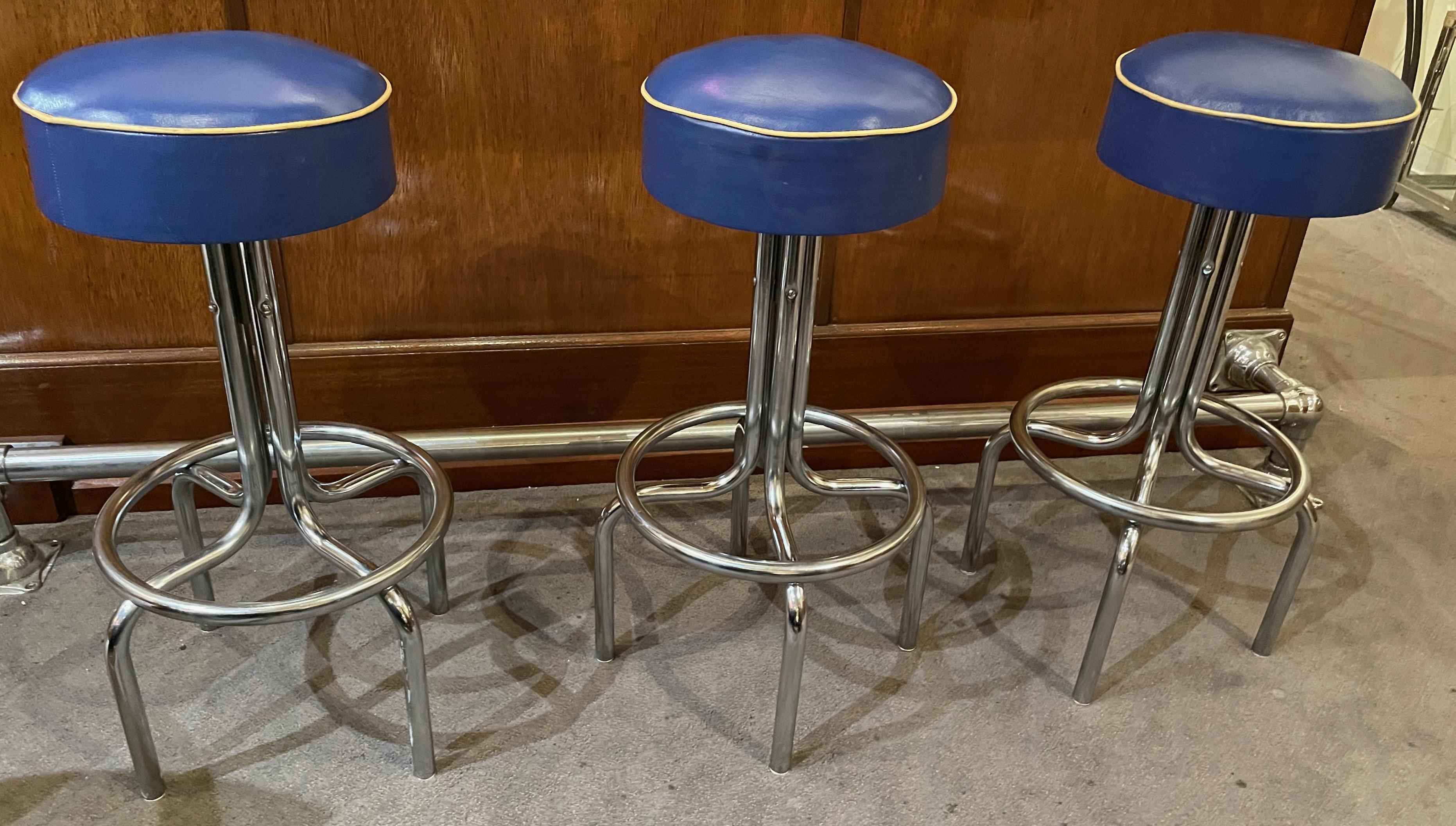 Art Deco chrome bar stools with swiveling original tops. Great looking and all original condition. Hard to find bar stools or counter seats. We have 6 in total and you can buy them in pairs, four or six. Unusual periwinkle color with contrasting