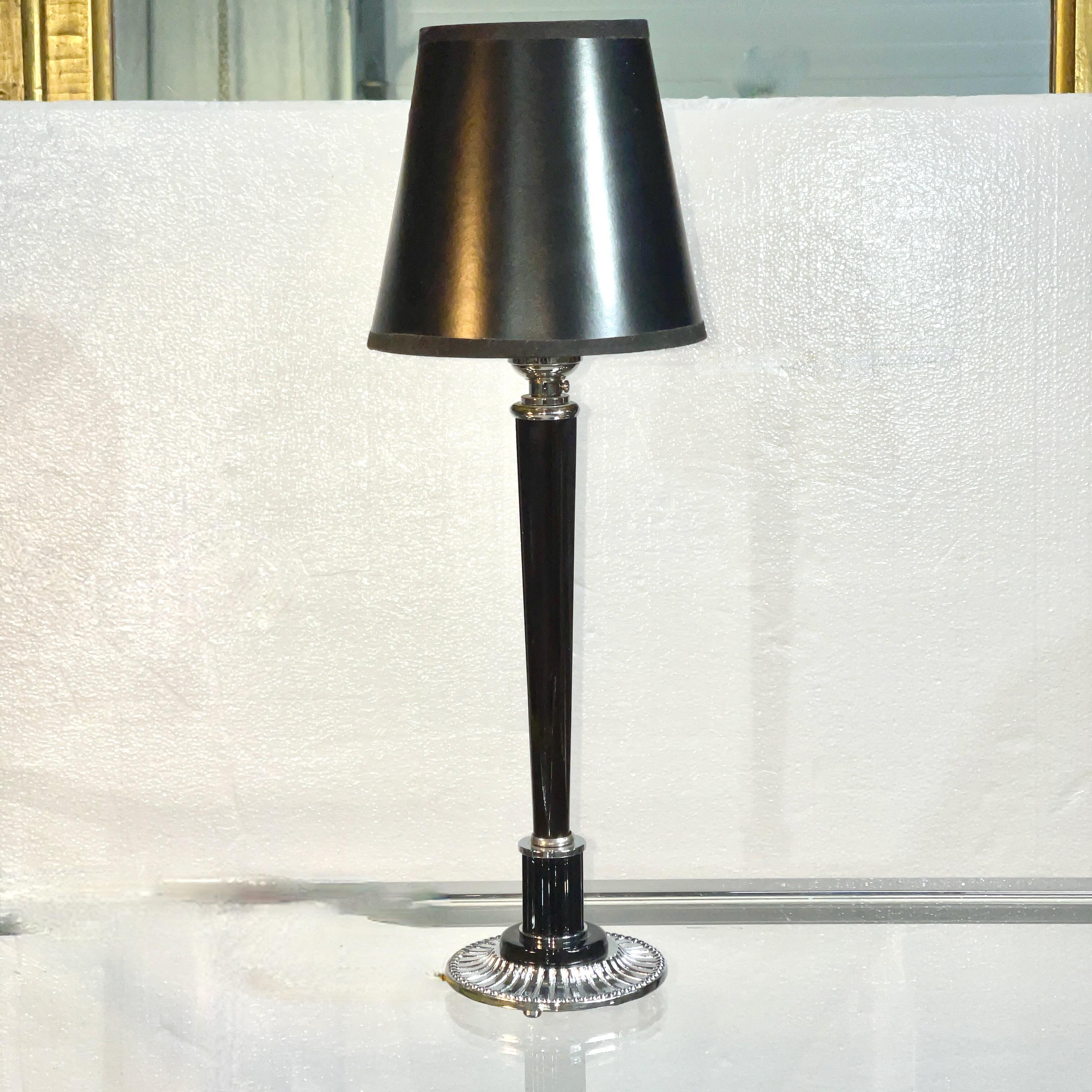 American art deco elongated tapered table lamp with chrome plated base and black enamel stem.
Includes black lampshade shown.