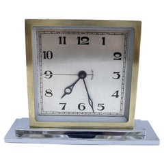 Reloj de pie Art Decó de cromo y latón, inglés, hacia 1930