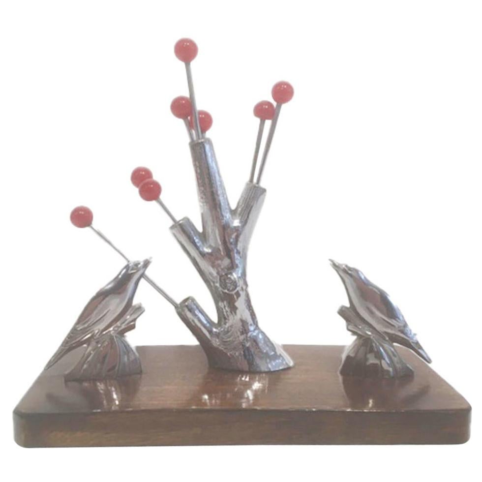 Art Deco, Chrome Cocktail Picks with Red Berry Tops in a Tree-Trunk with Birds