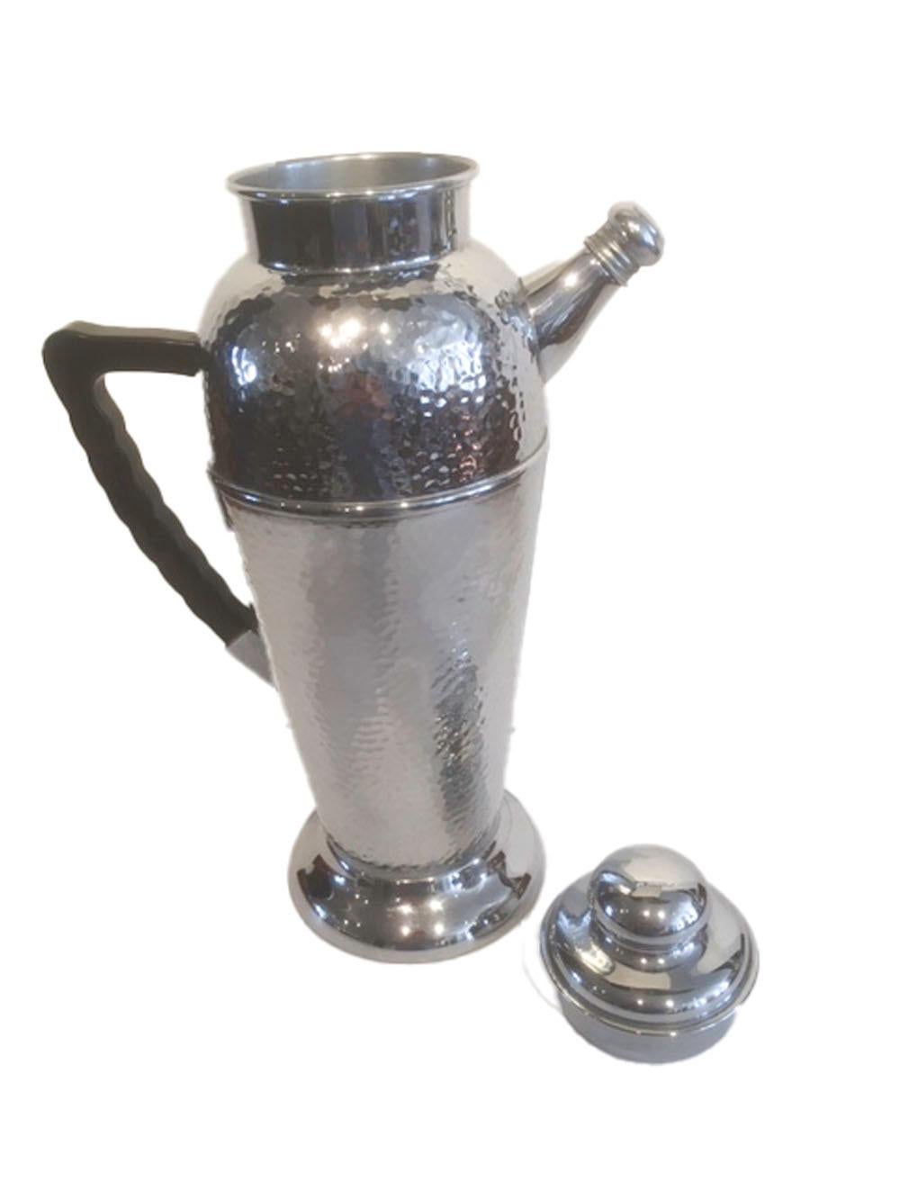 Vintage chrome cocktail shaker with black Bakelite handle. A large chrome shaker with overall hammered surface and stylized handle, marked Keystonware.