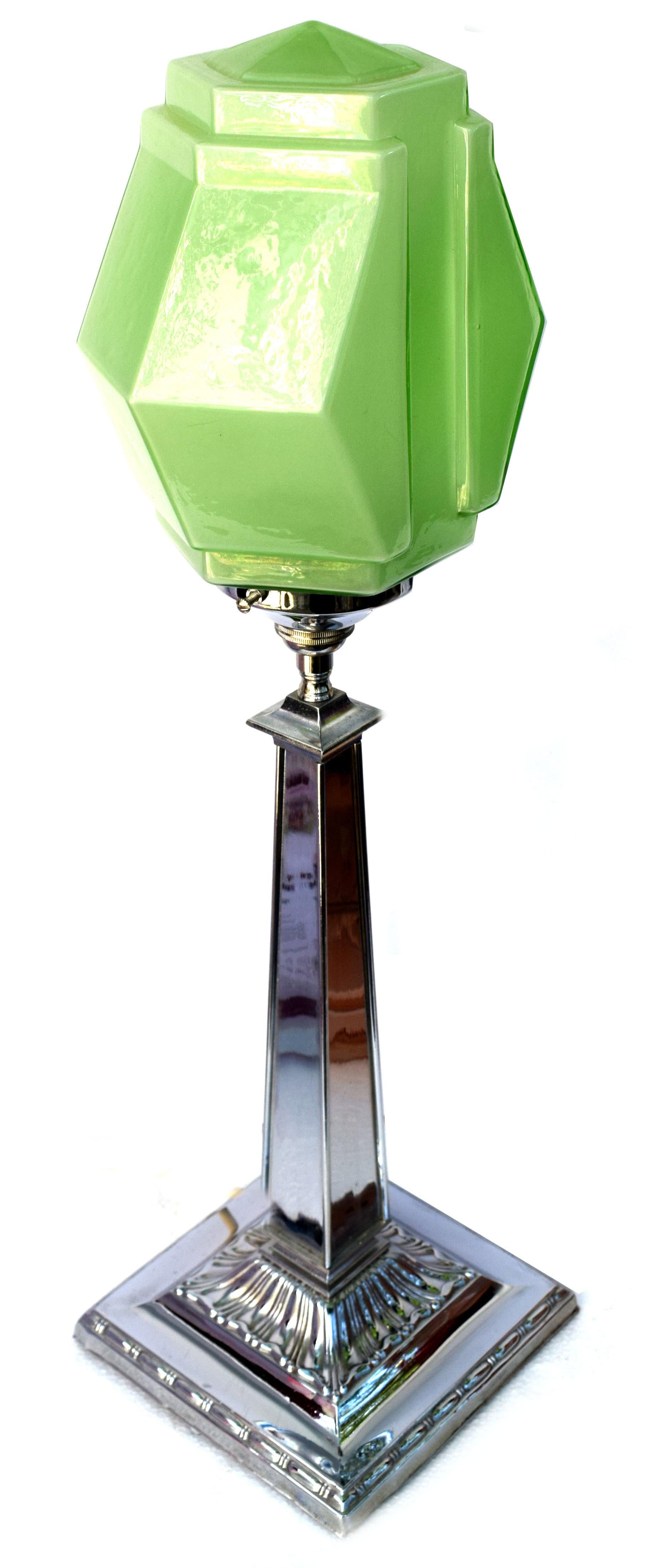 For your consideration is this very tall ( see dimensions ) and very elegant and original Art Deco chrome and glass table lamp, circa 1930s. Features a weighted chrome base nd column with a large pea green geometrically shaped glass shade. These
