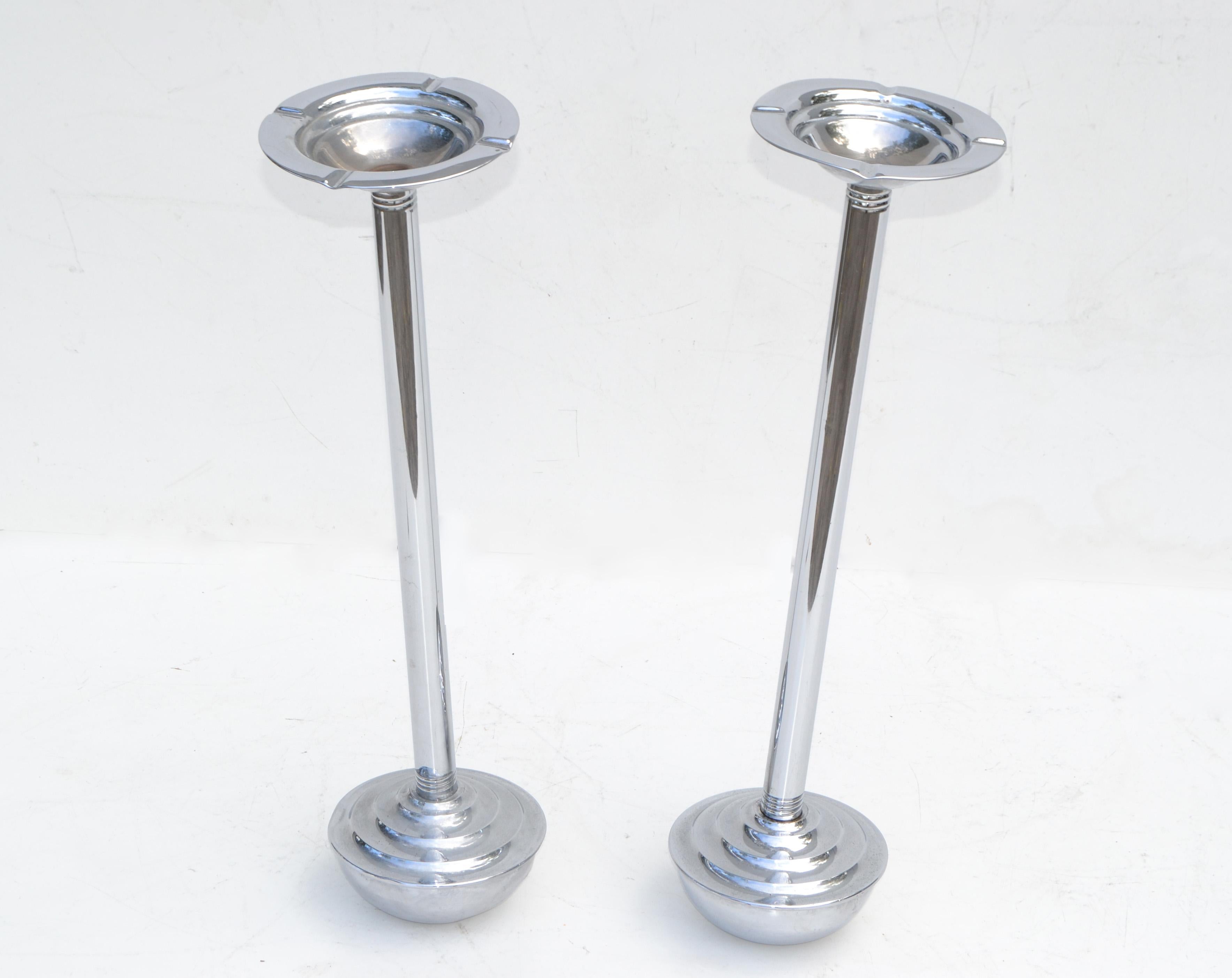 We offer two of Art Deco ashtray stands on heavy round base in chrome and metal.
Due to age and use they show wear and dents, but both are functional.
Priced per item.
Two available for $1200.