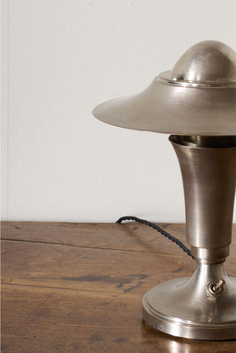 This is a totally original heavy chrome desk lamp by Kabeco. Art Deco in period and condition is stunning. Rare to see one in such good original condition. The size is also very neat and ideal on a desk or console. The design is the iconic mushroom