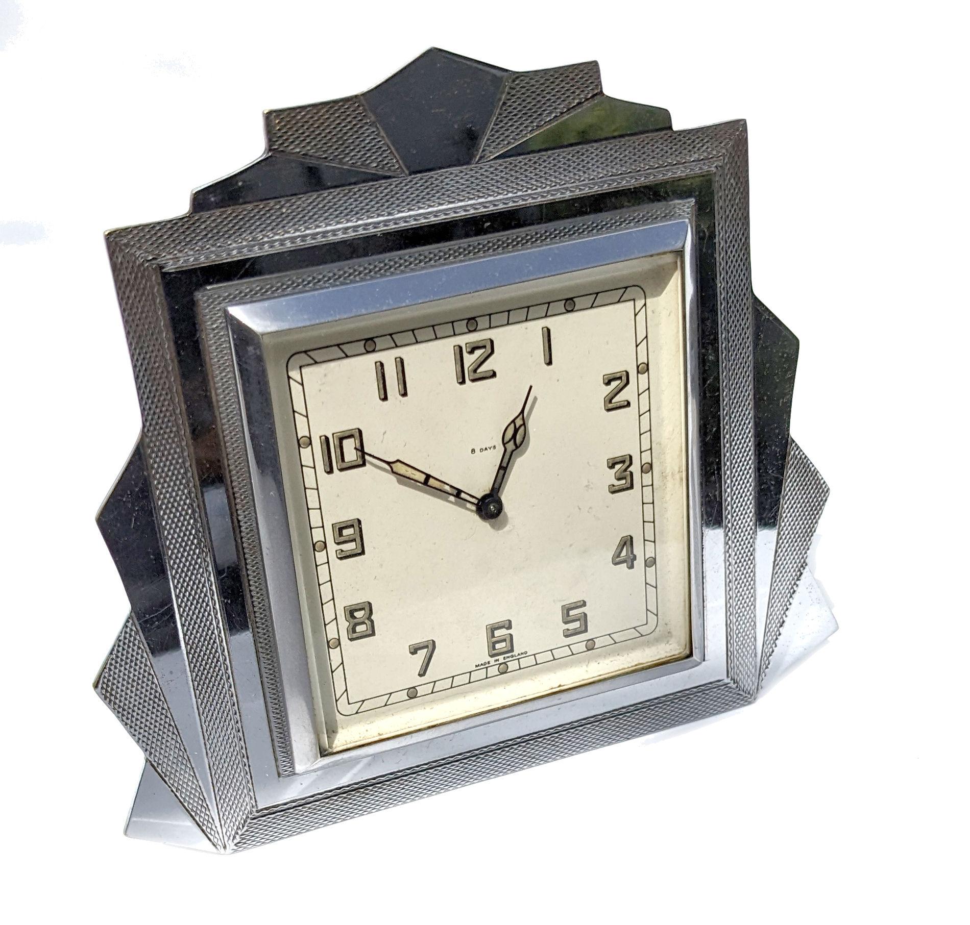 Is this very iconic shaped Art Deco chrome table clock made by the English Clockmakers 'Smiths' dating to 1930 the Art Deco period. Fully working and serviced by a qualified horologist. A superb Interiors piece perfect for a bedroom or lounge. The