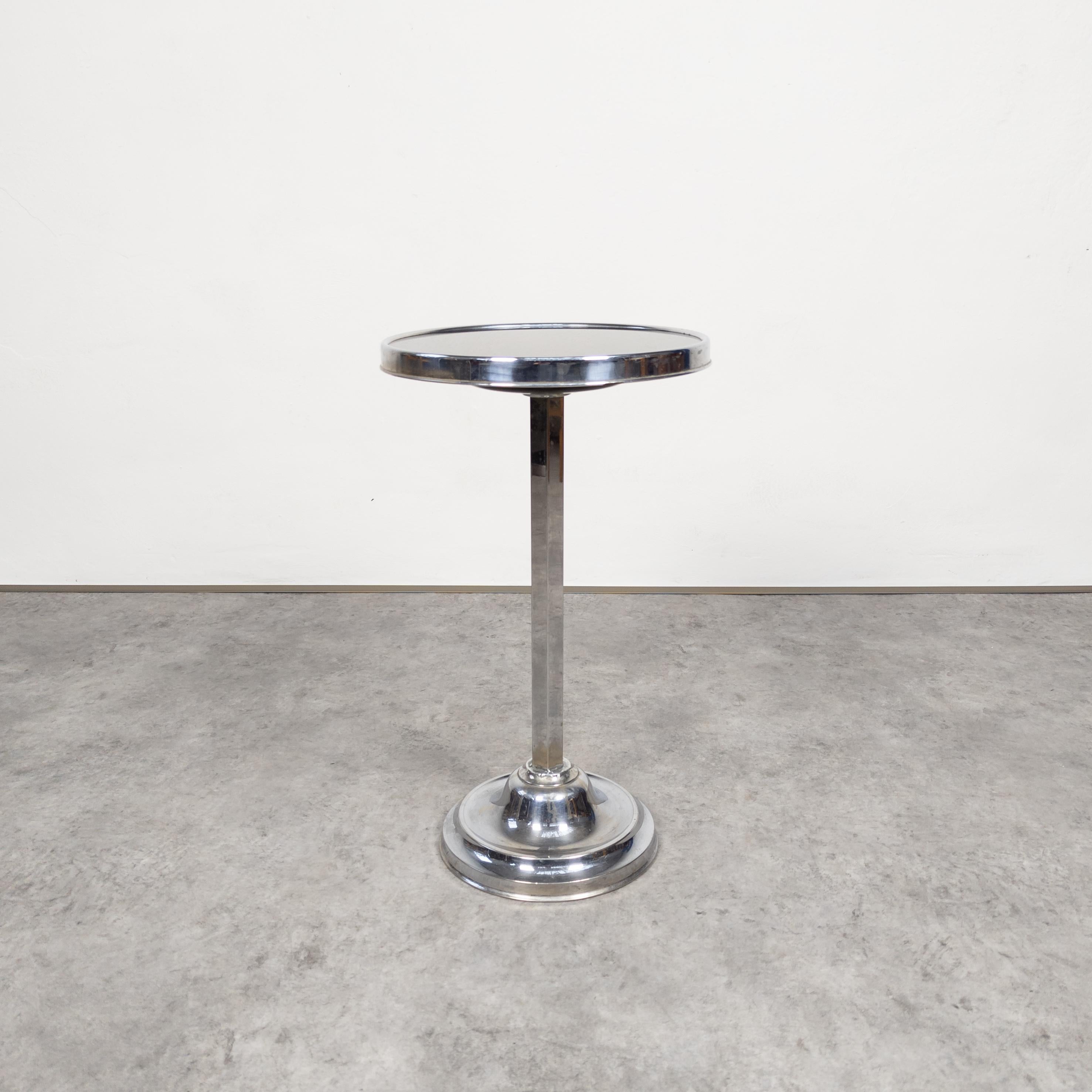 Smokers or side table manufactured by Gebrüder Mäher company, Czechoslovakia in 1930's. Chrome plated steel, opaline glass. In good vintage condition with some traces of wear and age. Height 58 cm, diameter 33 cm. Quite heavy for its size.