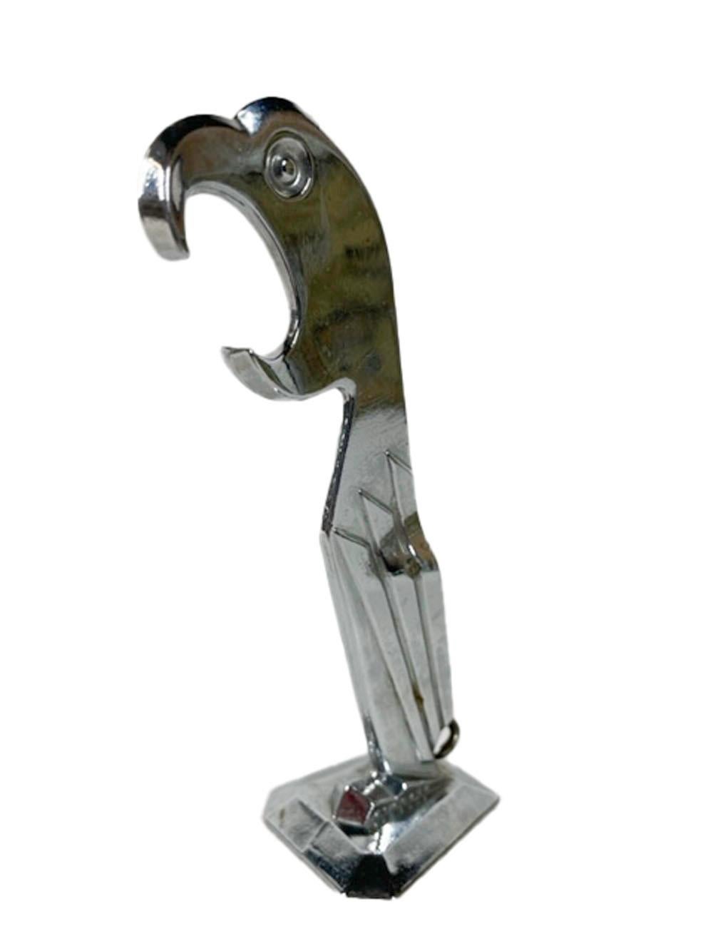 Art Deco stylized standing figure of a chrome plated parrot. Patented in 1929 its open mouth is a bottle opener while the corkscrew folds discretely into the back between the wings.