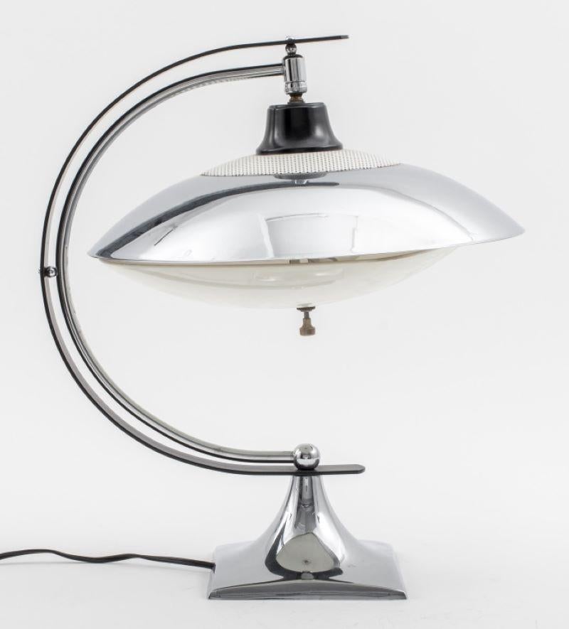 Art Deco chromed metal desk or table lamp of C shape with a floating chrome shade, on a square base. 17
