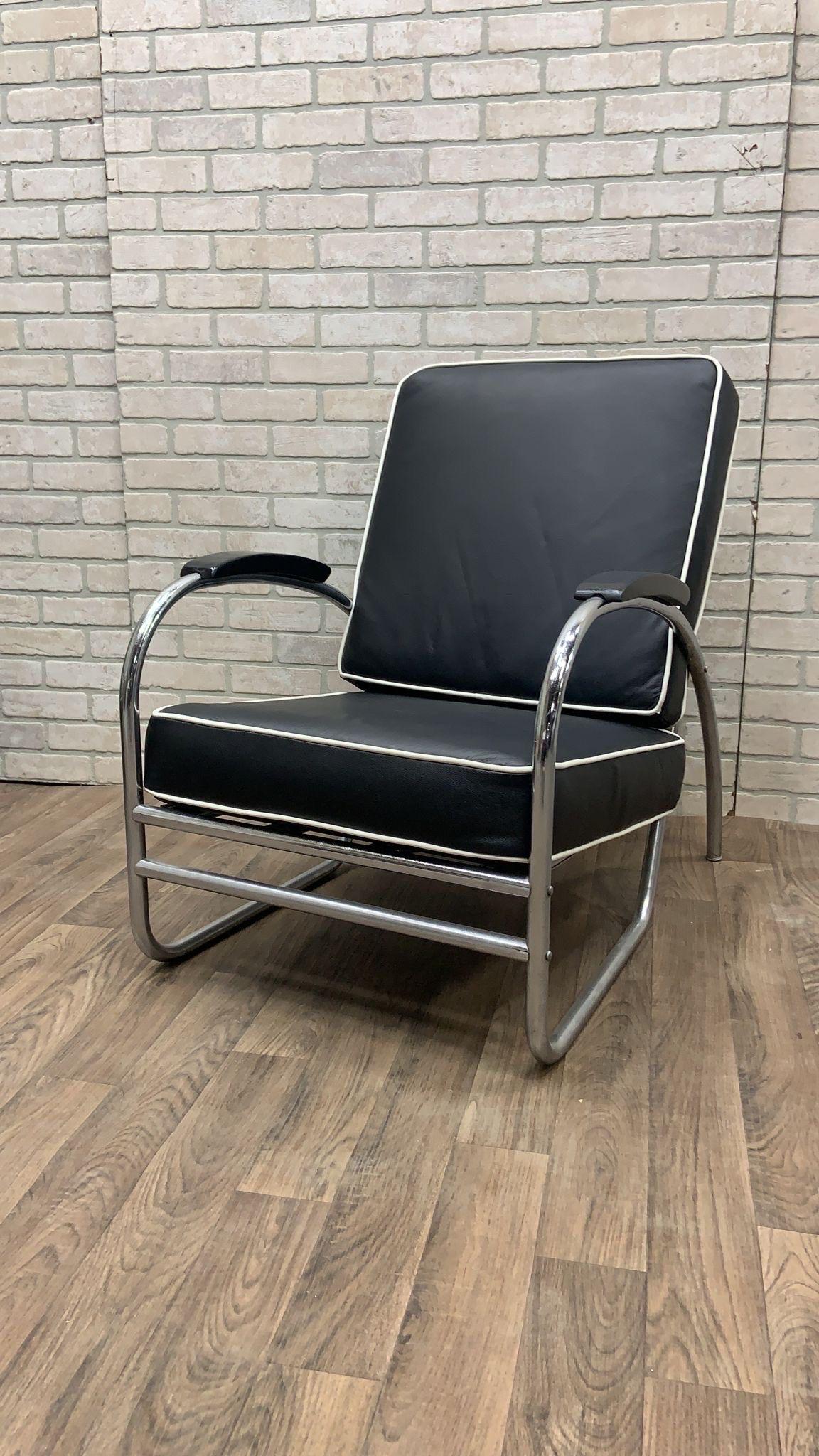 Art Deco Chrome Tubular Sofa & Lounge Chair Set in Black Leather - Set of 2 

This exquisite Art Deco sofa and lounge chair set designed by Kem Weber showcases the iconic streamline moderne style with its sleek chrome tubular frame and aerodynamic