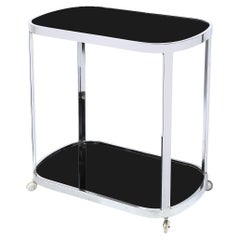 Art Deco Chrom Zweistöckiger rollender Servierwagen mit Einsatz aus schwarzem Vitrolite Art Deco Chrom Zweistöckiger rollender Servierwagen mit Einsatz aus schwarzem Vitrolite