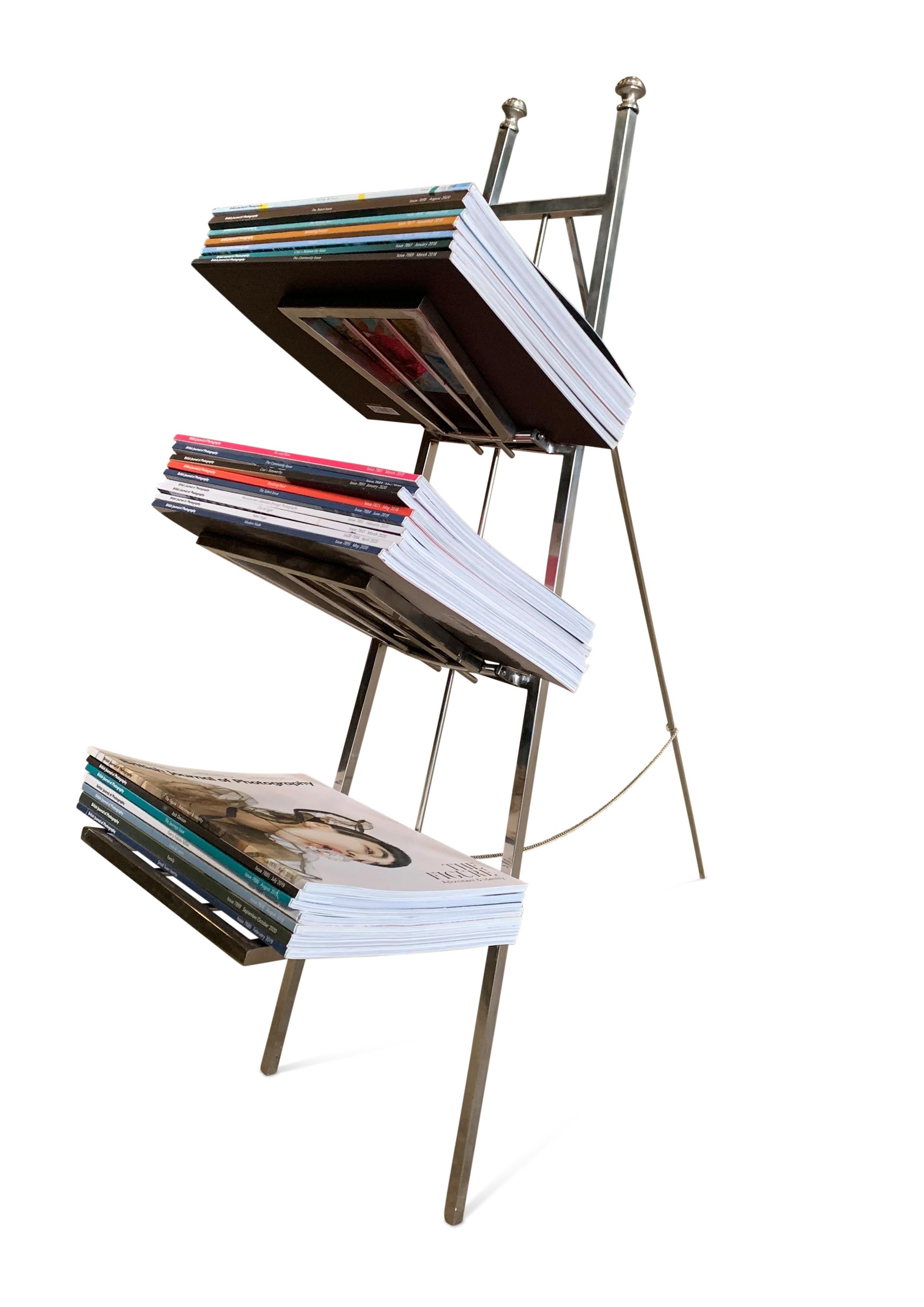 Art Deco Chromed Steel Folding Magazine Rack In a Figurative Ladder Form.

A really fun piece for a library or living space to hold magazine's.

