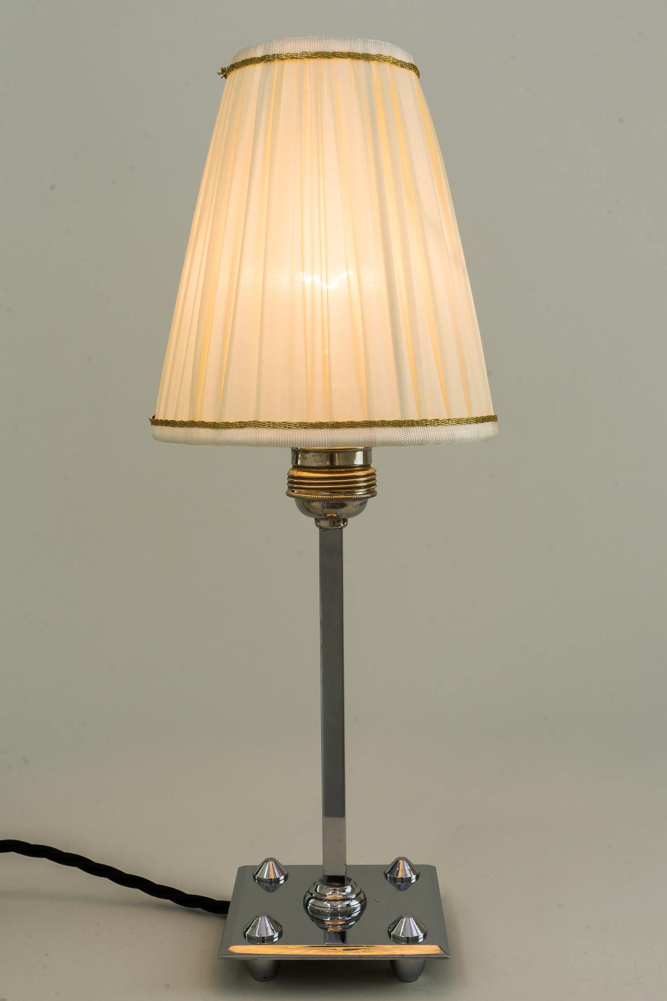 Art Deco chromed table lamp with fabric shade, Vienna, circa 1920s
Original condition
Fabric shade is replaced ( new ).