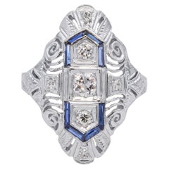 Art Decó Cromo Oro Blanco Diamante y Zafiro Filigrana Cena Anillo