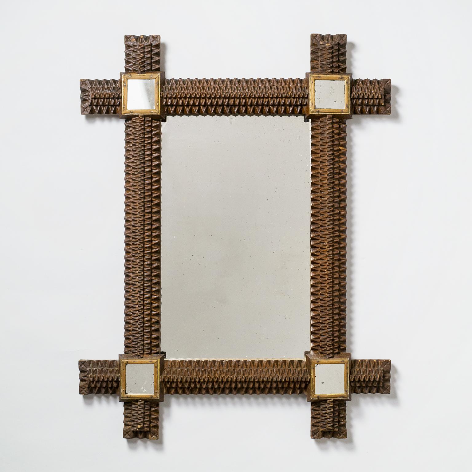 Very fine Art Deco mirror with intricate geometric woodwork. On the top left of the backside it is signed and dated 
