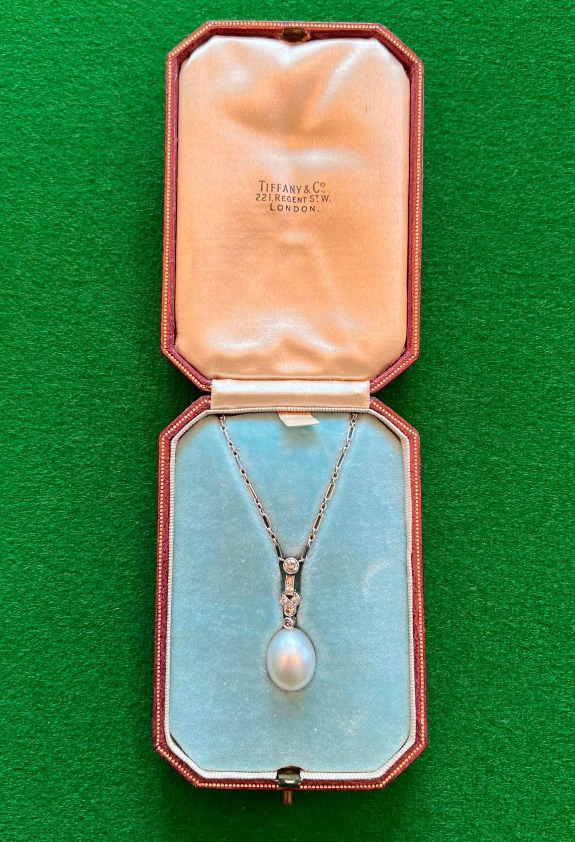 Royal House Antiques

Royal House Antiques is delighted to offer for sale this exquisite circa 1920’s Art Deco Tiffany & Co platinum diamond and pearl pendant necklace

A truly stunning piece, the chain and mounts are both platinum, with multiple