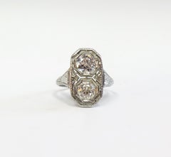 Art Deco circa 1930, Two-Stone Filigree Ring in 18 Karat White Gold