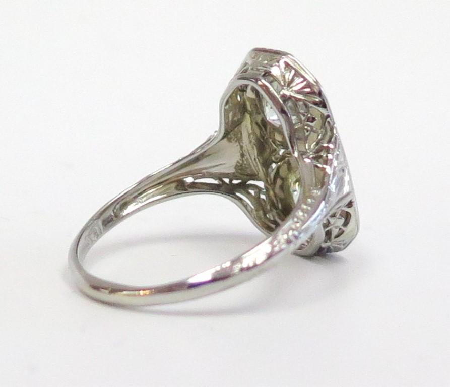 Art Deco circa 1930, Two-Stone Filigree Ring in 18 Karat White Gold In Good Condition For Sale In Bellmore, NY