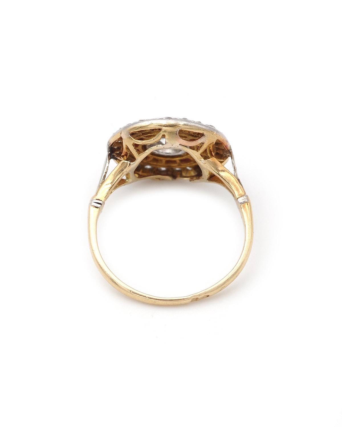 Art Déco Anello Art Deco circolare con rubino e diamante da 0,33 carati in oro 18 carati e platino in vendita