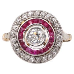 Anello Art Deco circolare con rubino e diamante da 0,33 carati in oro 18 carati e platino