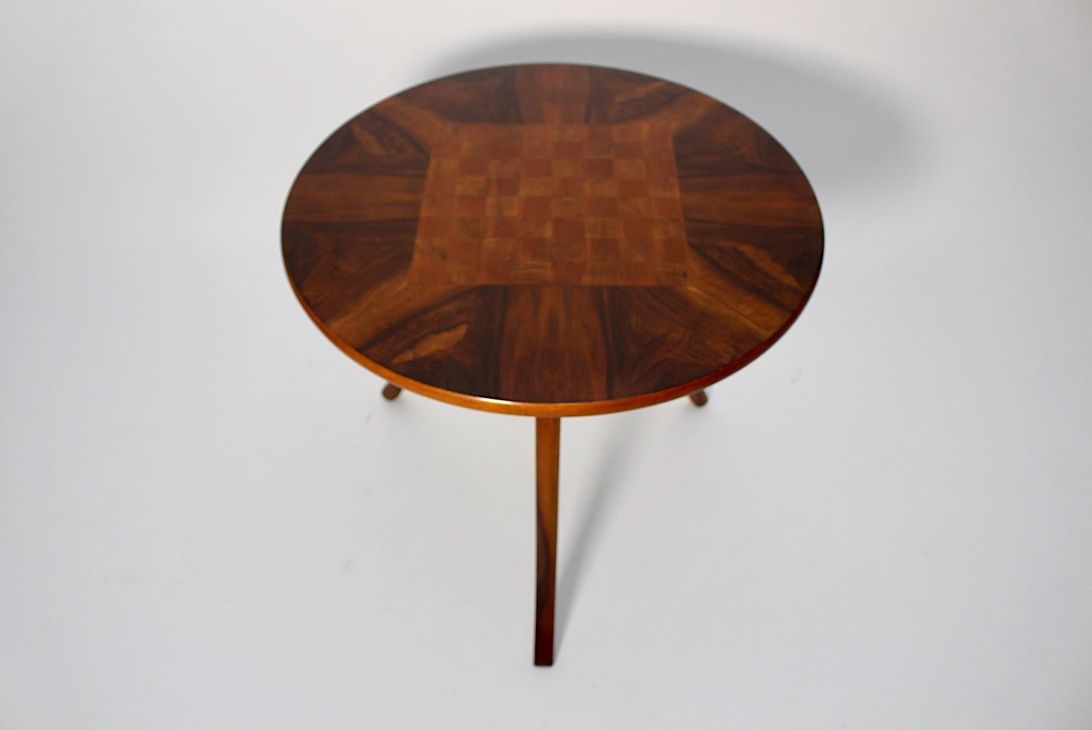 Art Deco vintage side table or coffee table circular like with a chess table top from walnut, cherry and poplar veneer by Josef Frank for Haus & Garten circa 1925 Vienna.
An amazing side table with chess pattern topped from solid walnut, cherry and