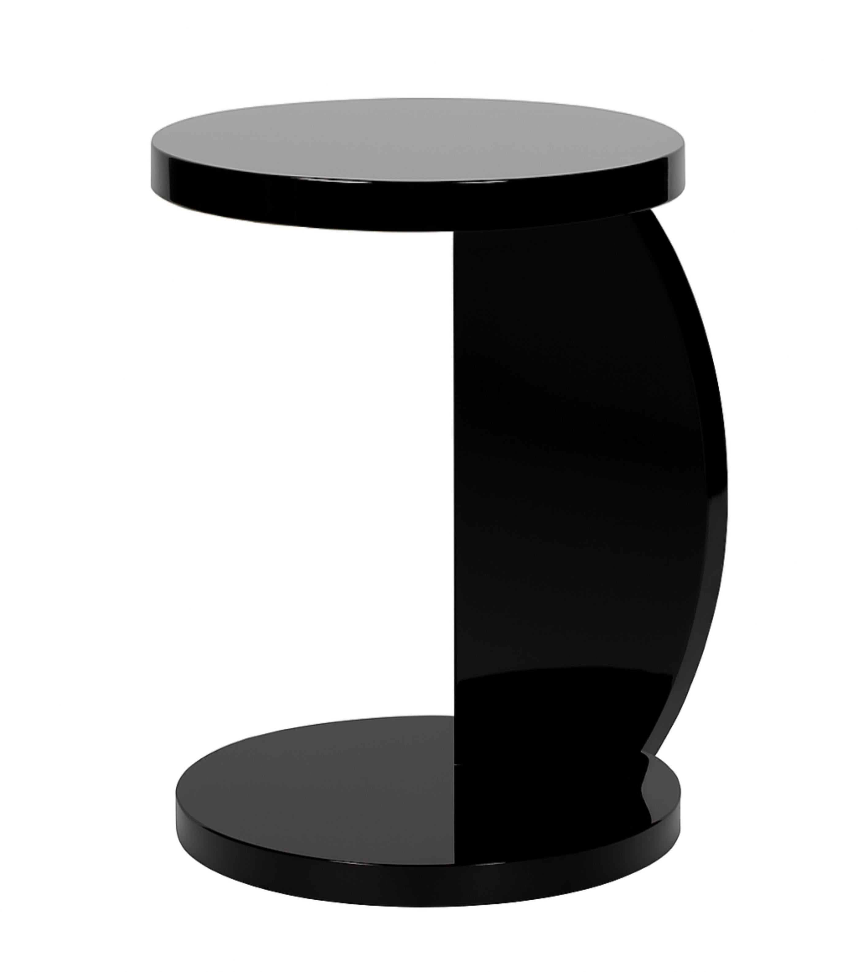 This Art Deco C-Shaped Black Lacquer color Side Table design, expertly crafted in walnut. 
It has an elegant and rare design, with two smooth circular trays, one placed atop the other, supported by a C-shaped arched base.
This piece is ideal for