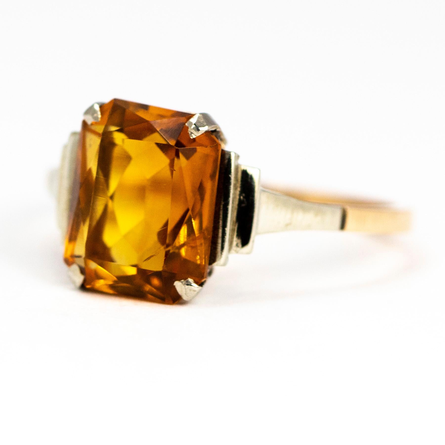 The Art Deco style to this ring is gorgeous, it has step detail either side of the 3carat Citrine stone. The stone is set in white gold and the rest of the ring is modelled in 9ct gold. 

Ring Size: O 1/2 or 7 1/2 
Stone Dimensions: 10 x 8mm